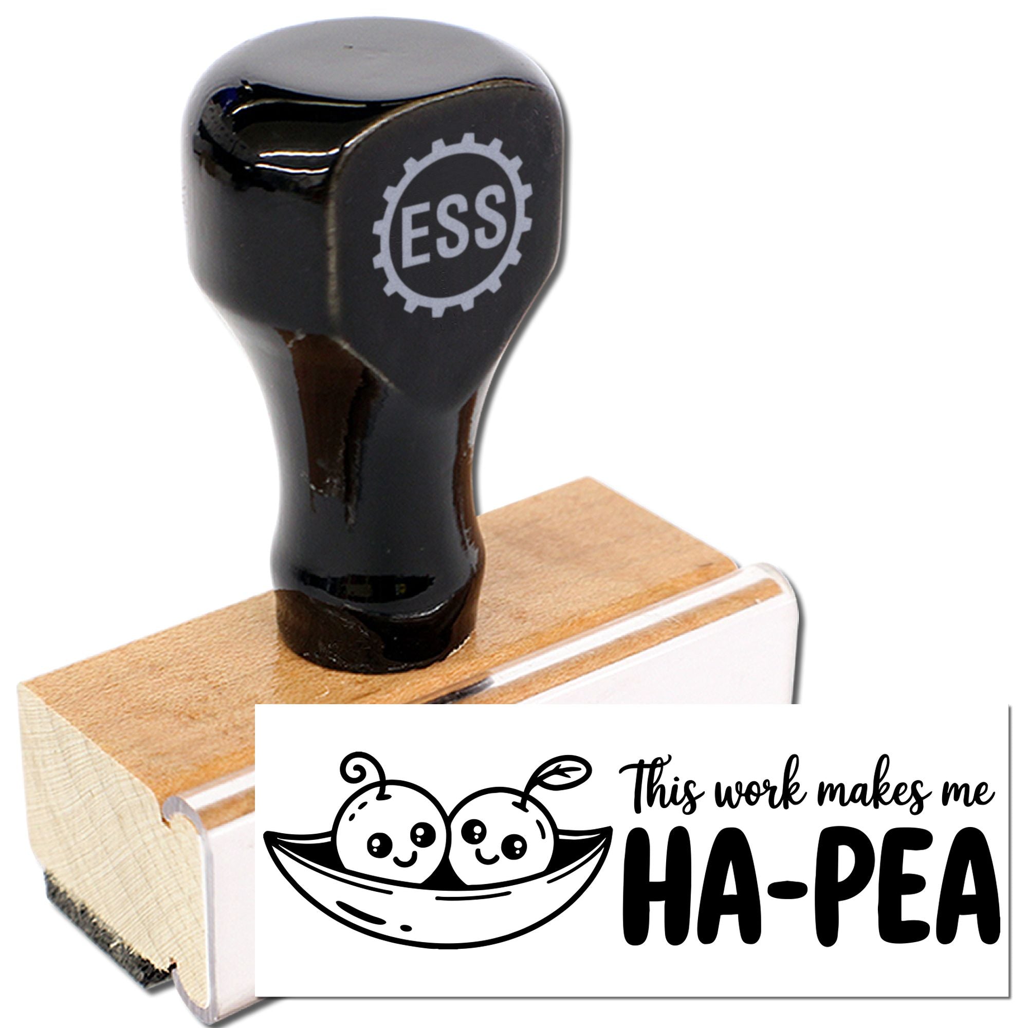 Black ESS rubber stamp on wooden block, with sample seal reading This work makes me HA-PEA and pea pod graphic.