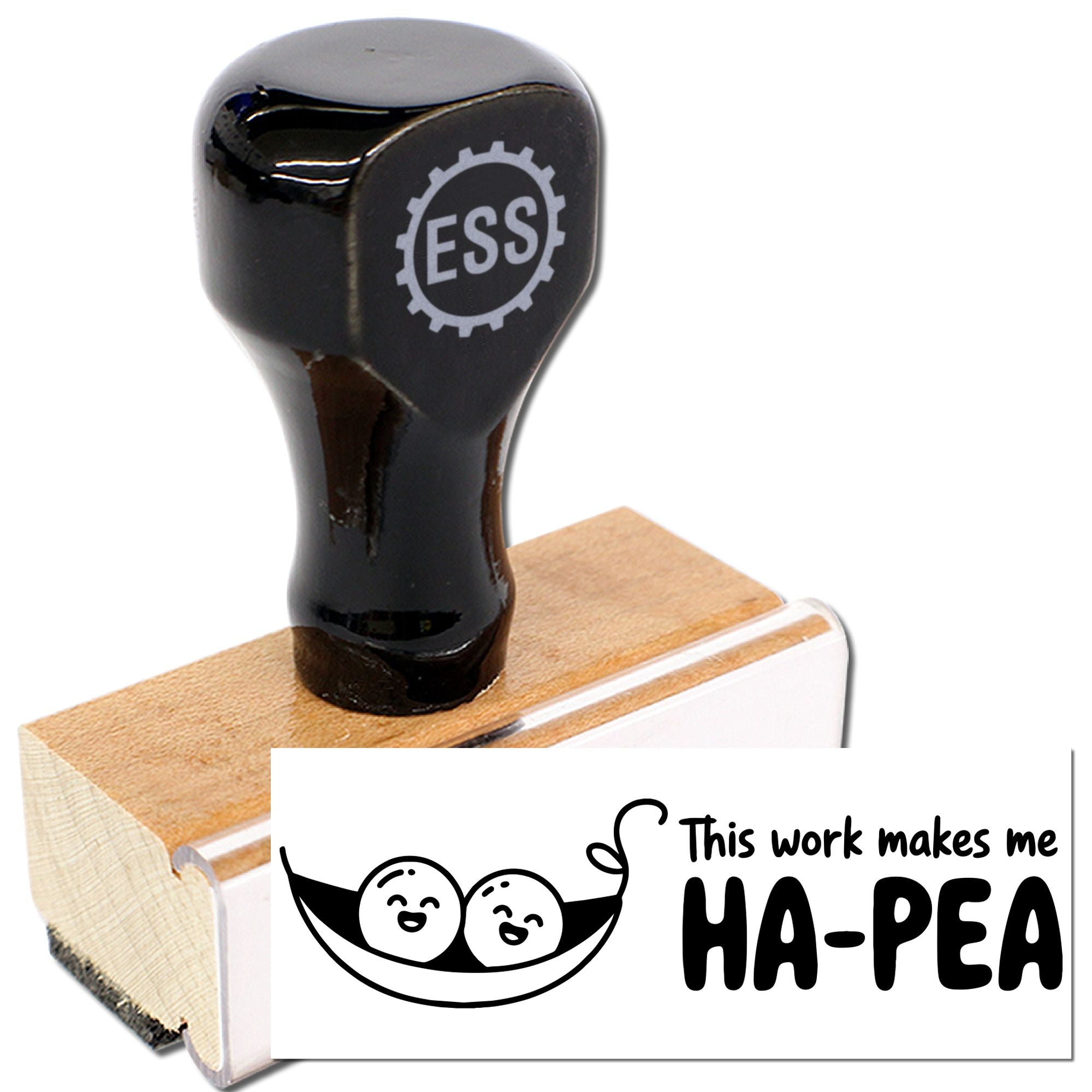 Black self-inking stamp and seal with ESS logo, wooden base, printing a smiling pea pod and "This work makes me HA-PEA".