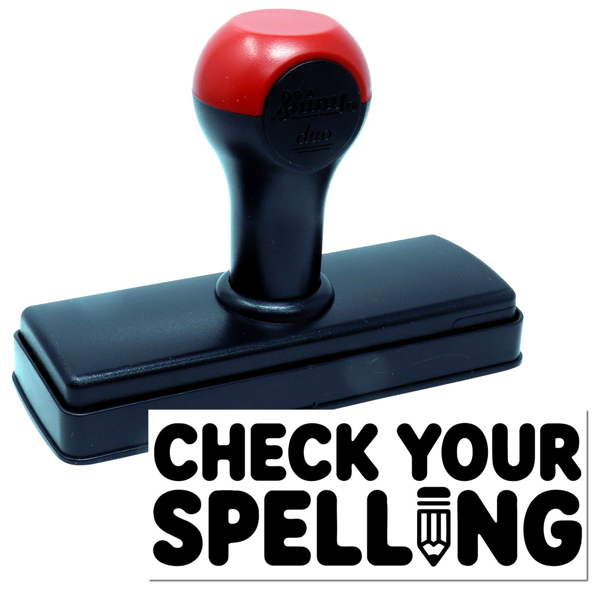 Shiny Teacher Spelling Feedback Stamp with "Check Your Spelling" hand stamp in black ink on a white background.