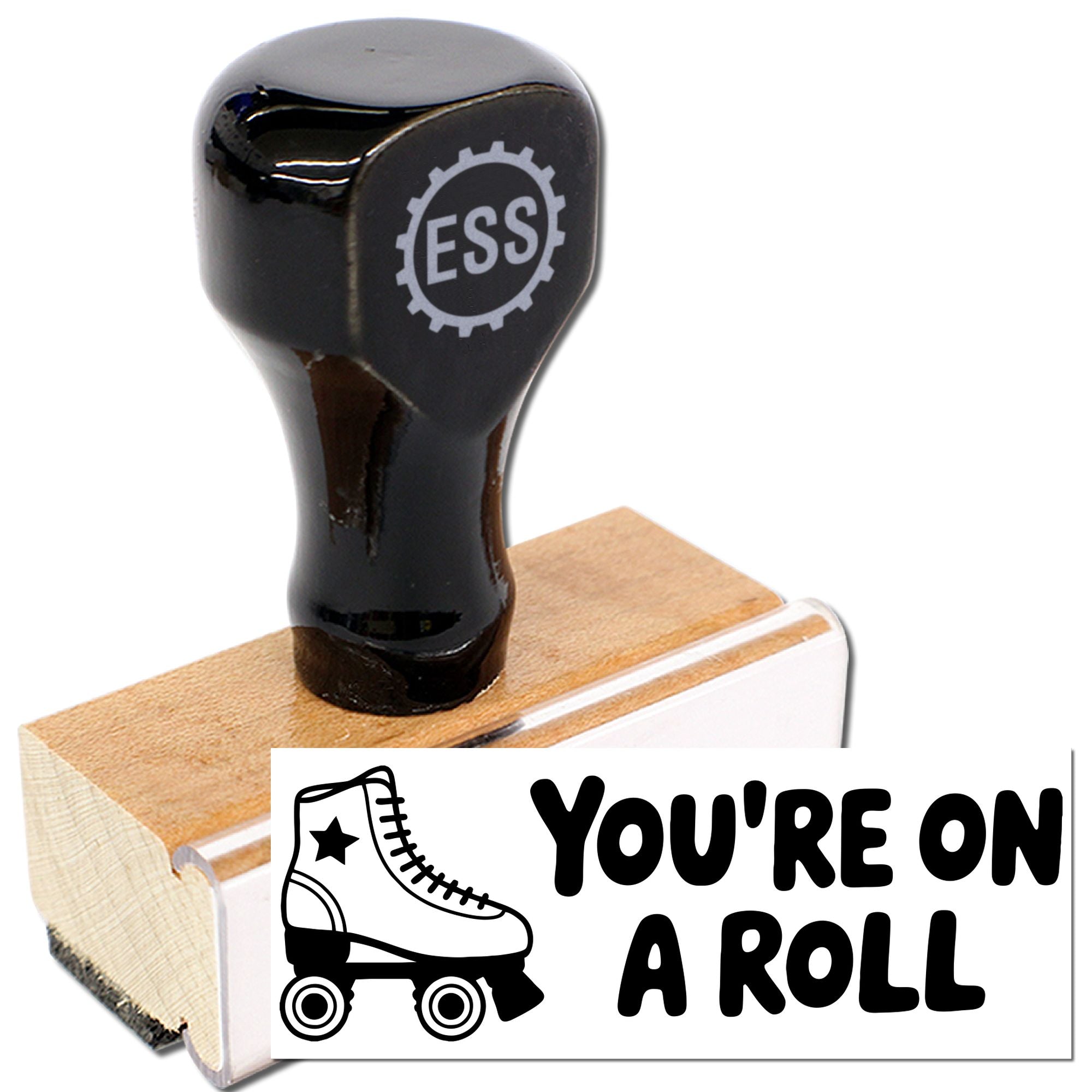 Black ESS seal stamp with wooden base and white Youre on a Roll roller skate design.