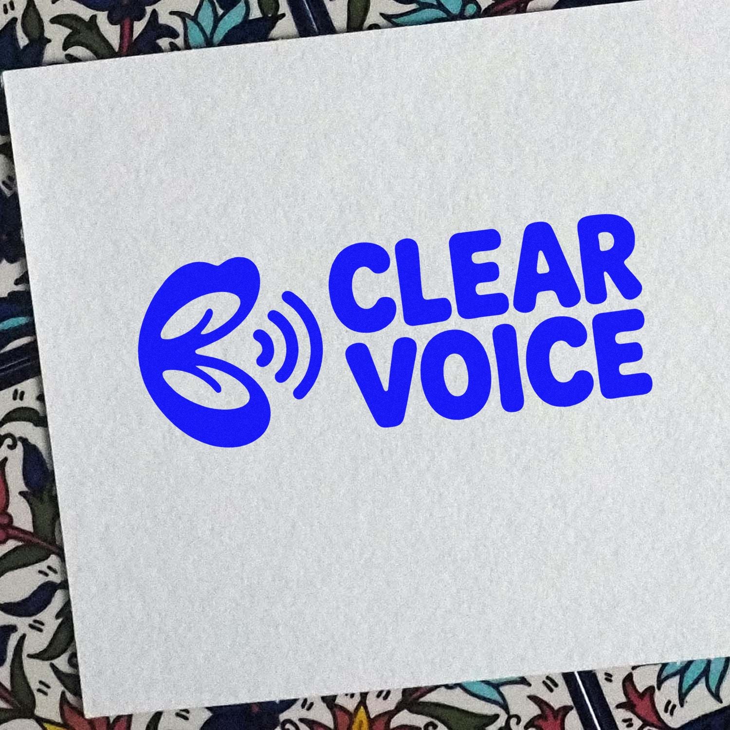 Blue Clear Voice stamp and seal logo with blue sound icon on white paper