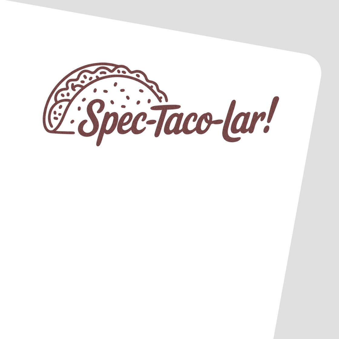 Brown taco stamp seal with Spec-taco-lar! text and taco icon on white background.