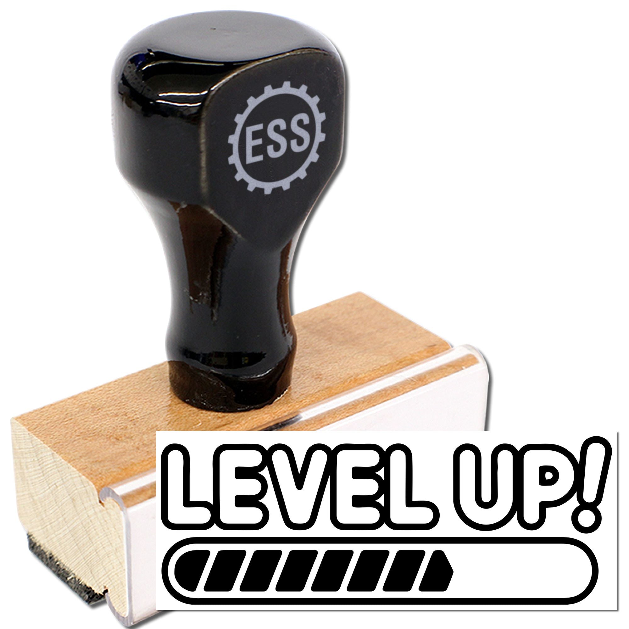 Black rubber stamp and seal with ESS logo on wooden base, showing LEVEL UP! with bold progress bar.