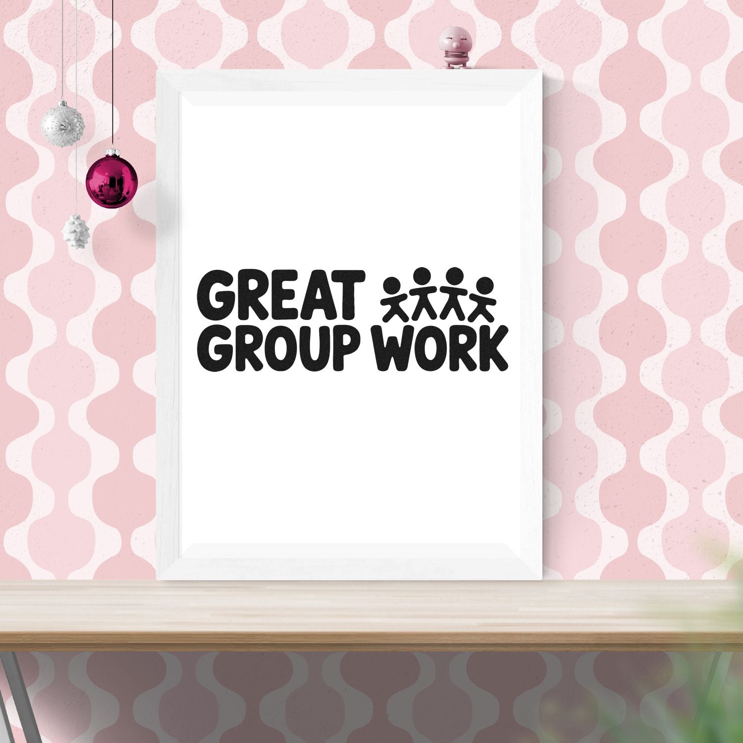 Black Great Group Work stamp seal on white frame, set against a pink patterned background with hanging ornaments.