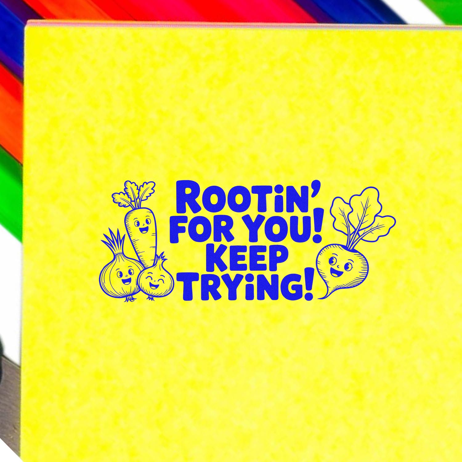 Yellow stamp and seal sheet with blue Rootin for You! Keep Trying! text and smiling vegetable designs, bordered by rainbow stripes.