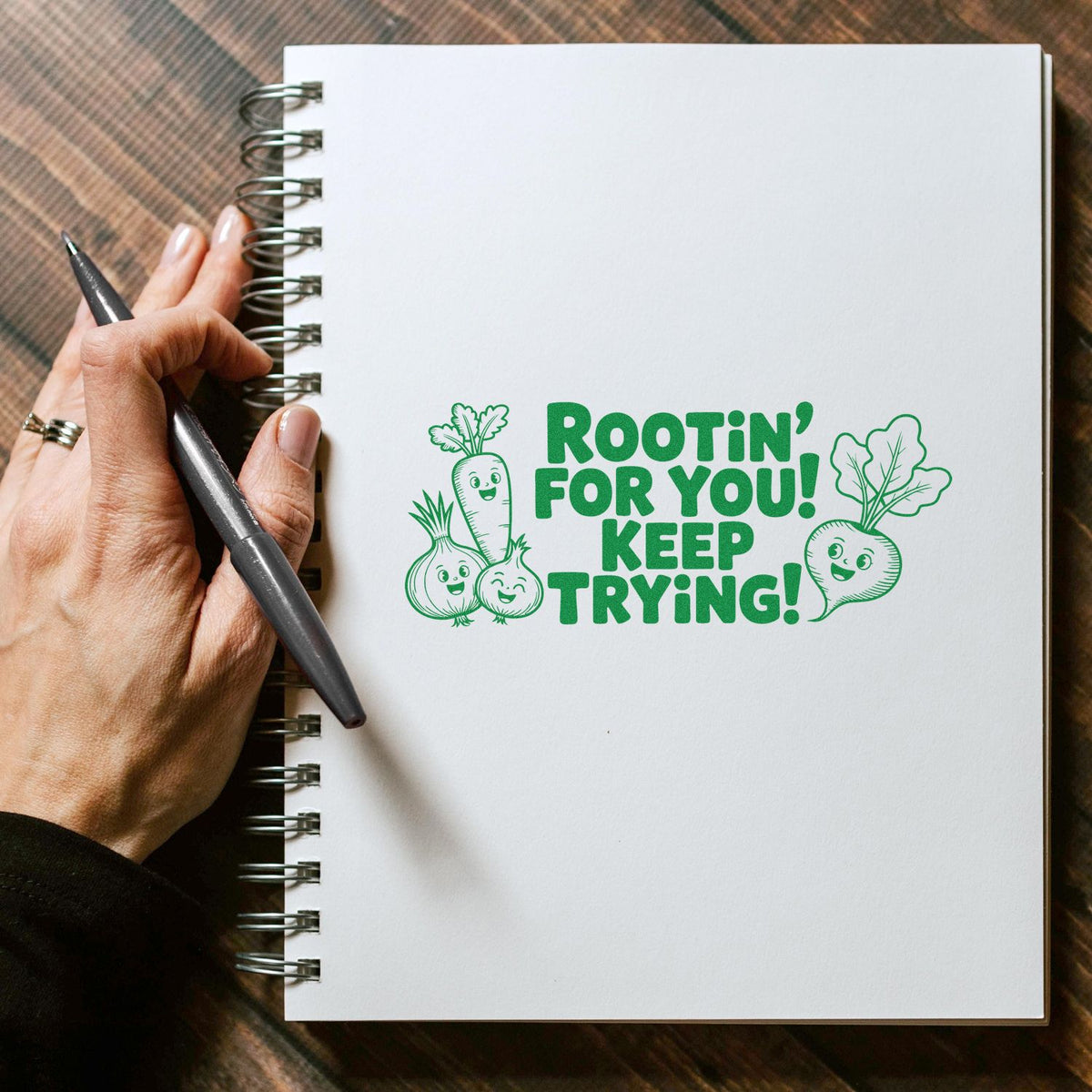 Trodat Raised Your Hand Nice Job positive feedback teacher stamp in use, featuring a pre-inked stock stamp design for classroom praise.