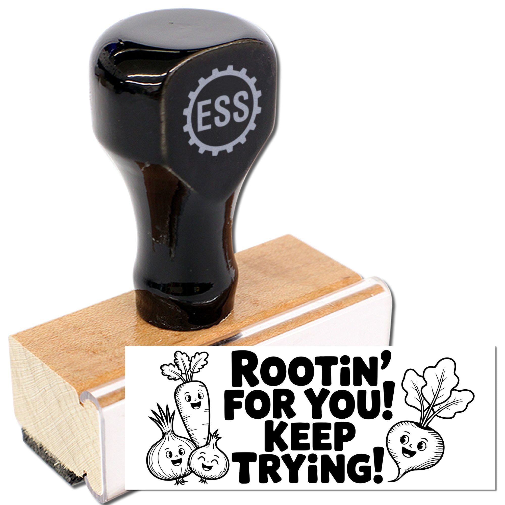 Black ESS rubber stamp on wooden handle beside a Rootin for You! Keep Trying! seal with cartoon vegetables.