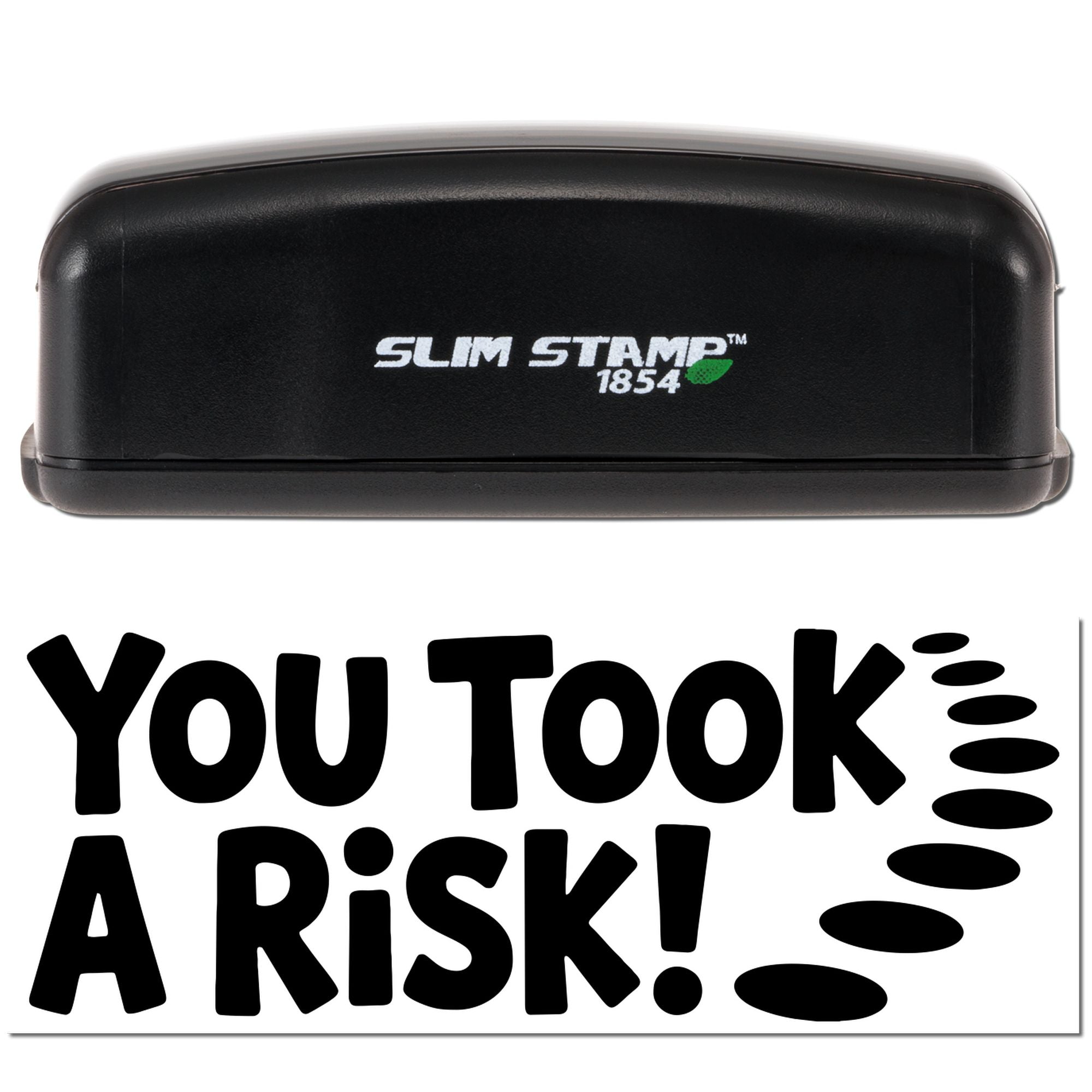 Black Slim Stamp 1854 self-inking stamp with bold You Took A Risk! seal imprint on white background