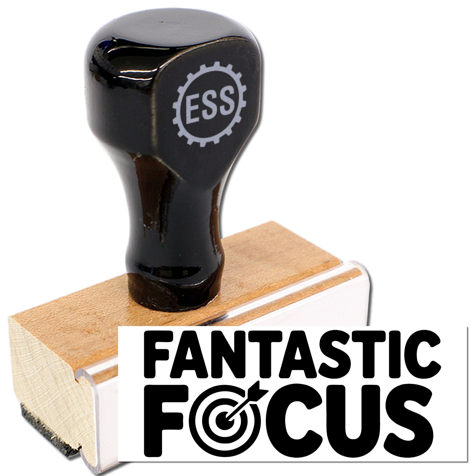 Glossy black ESS stamp seal on tan wooden block with white Fantastic Focus branding