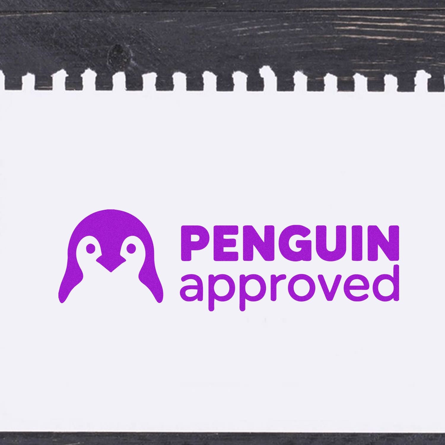 Purple Penguin Approved stamp and seal in purple on white, with black borders and a perforated top edge.