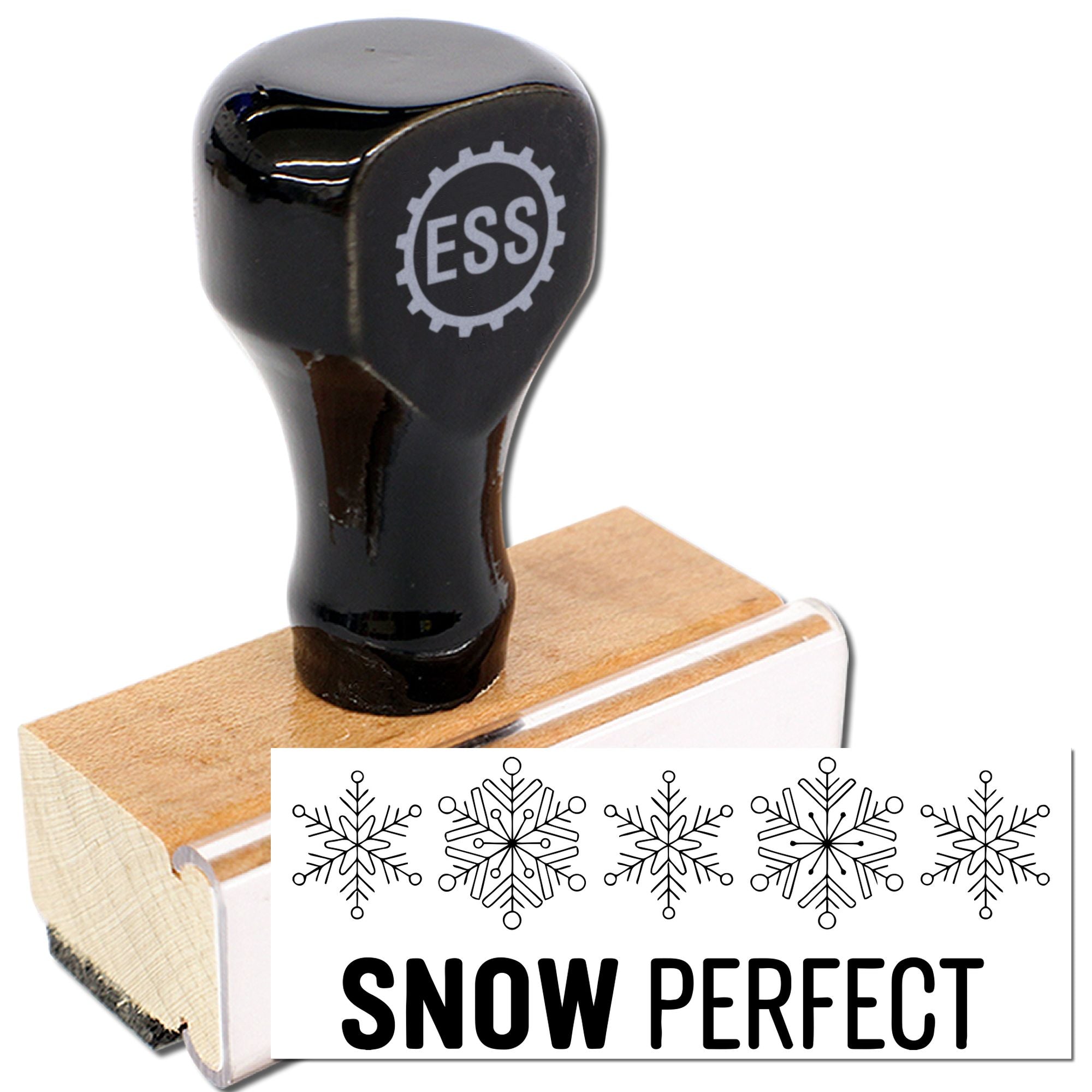 Black ESS rubber stamp with wooden handle and Snow Perfect snowflake seal on white background