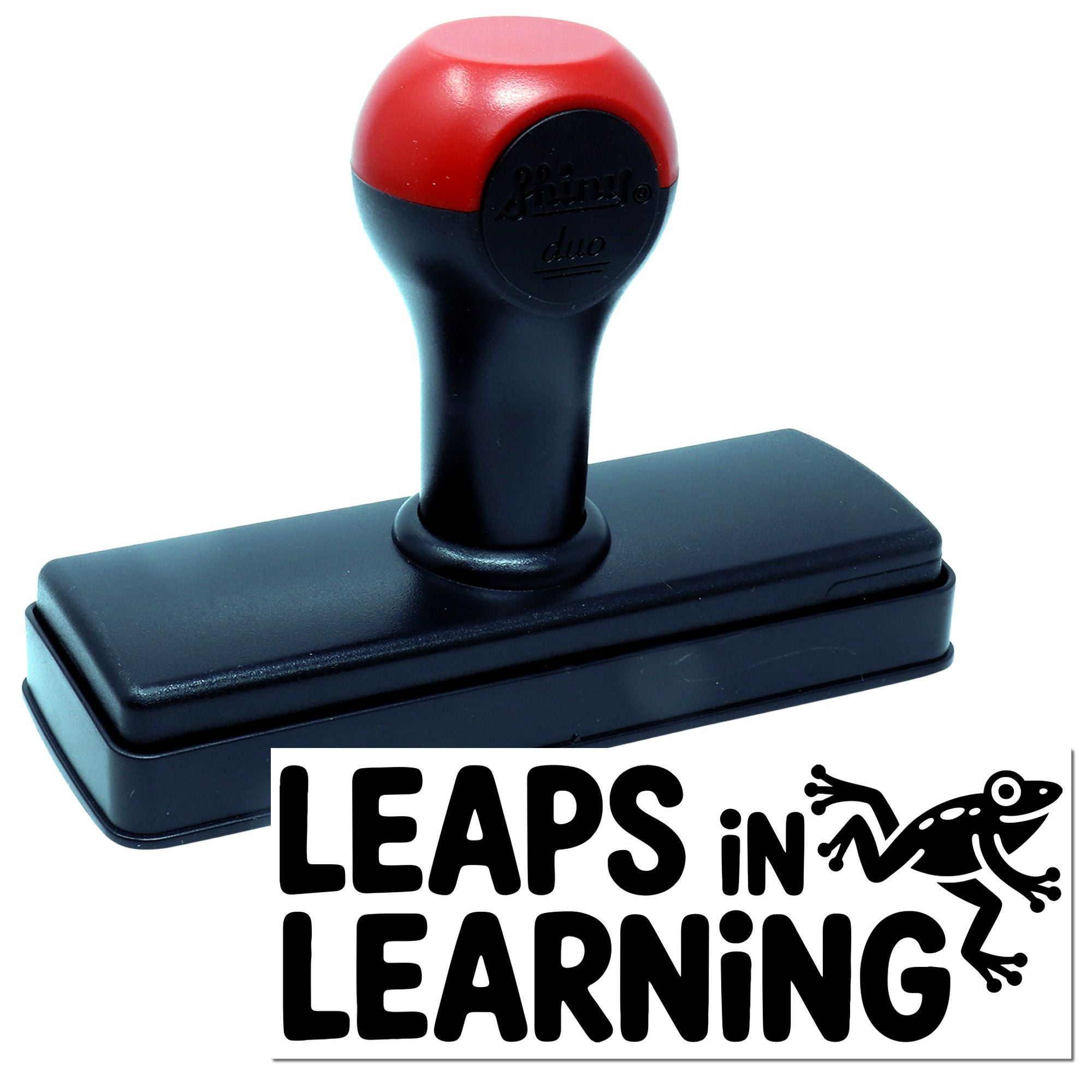 Red-and-black self-inking stamp and seal with LEAPS IN LEARNING frog logo on a white background