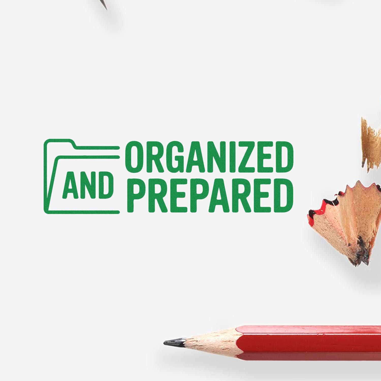 Green stamp and seal reading Organized and Prepared with folder icon on white, beside a red pencil tip and shavings.