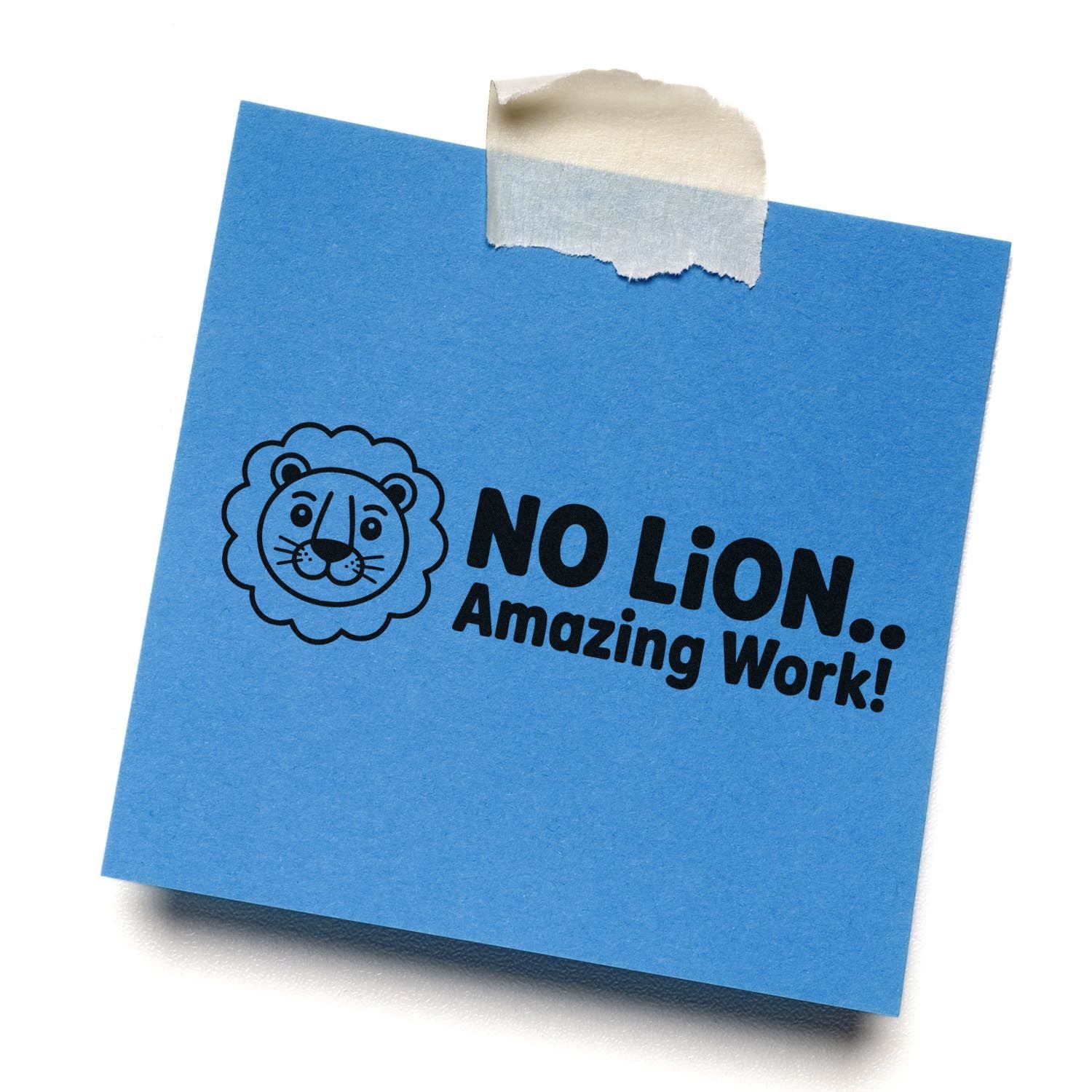Blue sticky note with black lion stamp seal and No Lion... Amazing Work! text, taped at top with white masking tape.