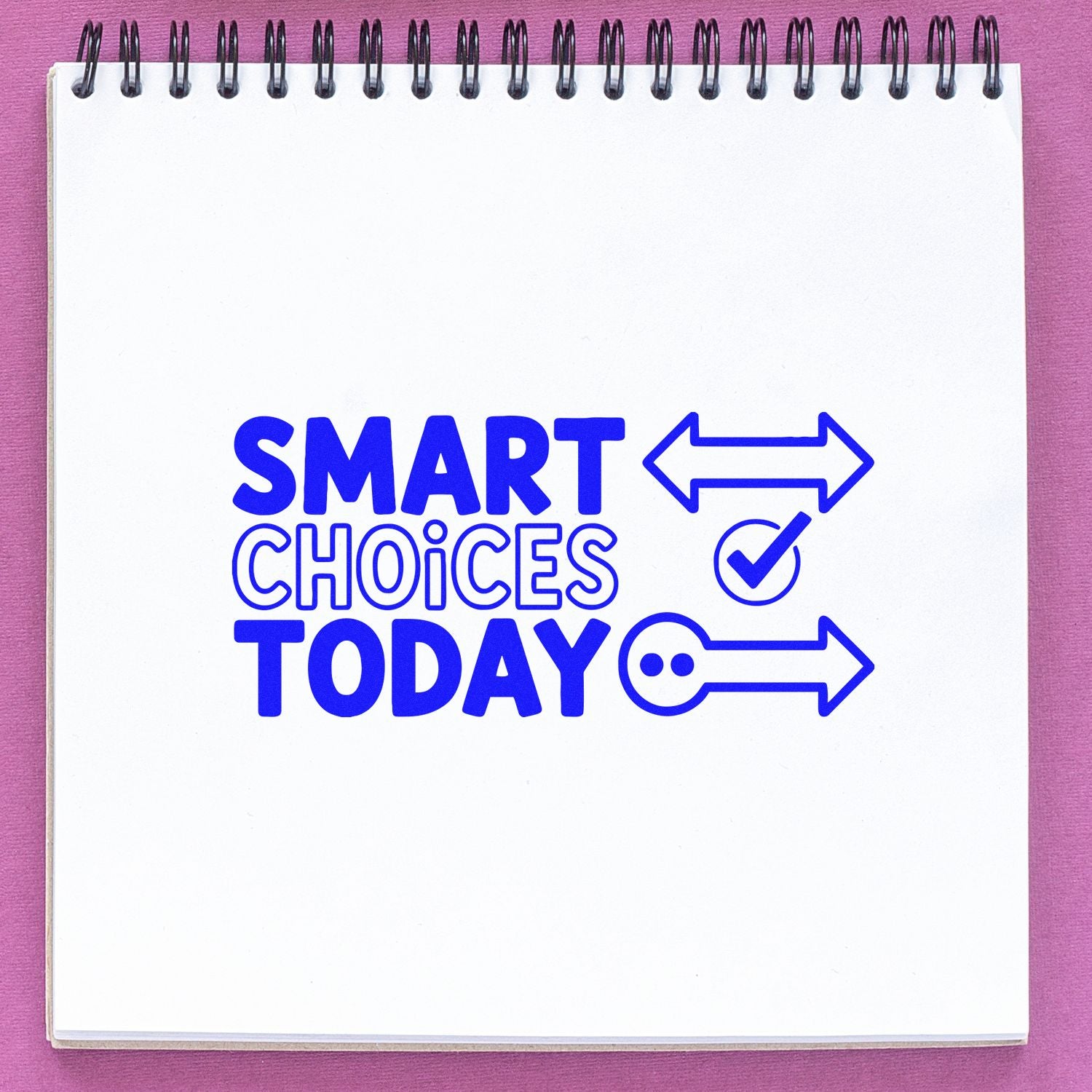 Blue stamp-style seal reading SMART CHOICES TODAY with arrows and a check mark on a white spiral notepad over pink.