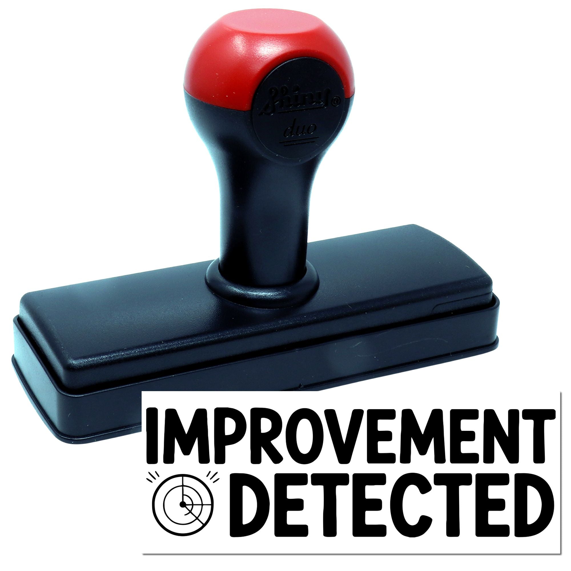 Red and black self-inking stamp and seal with bold Improvement Detected text.