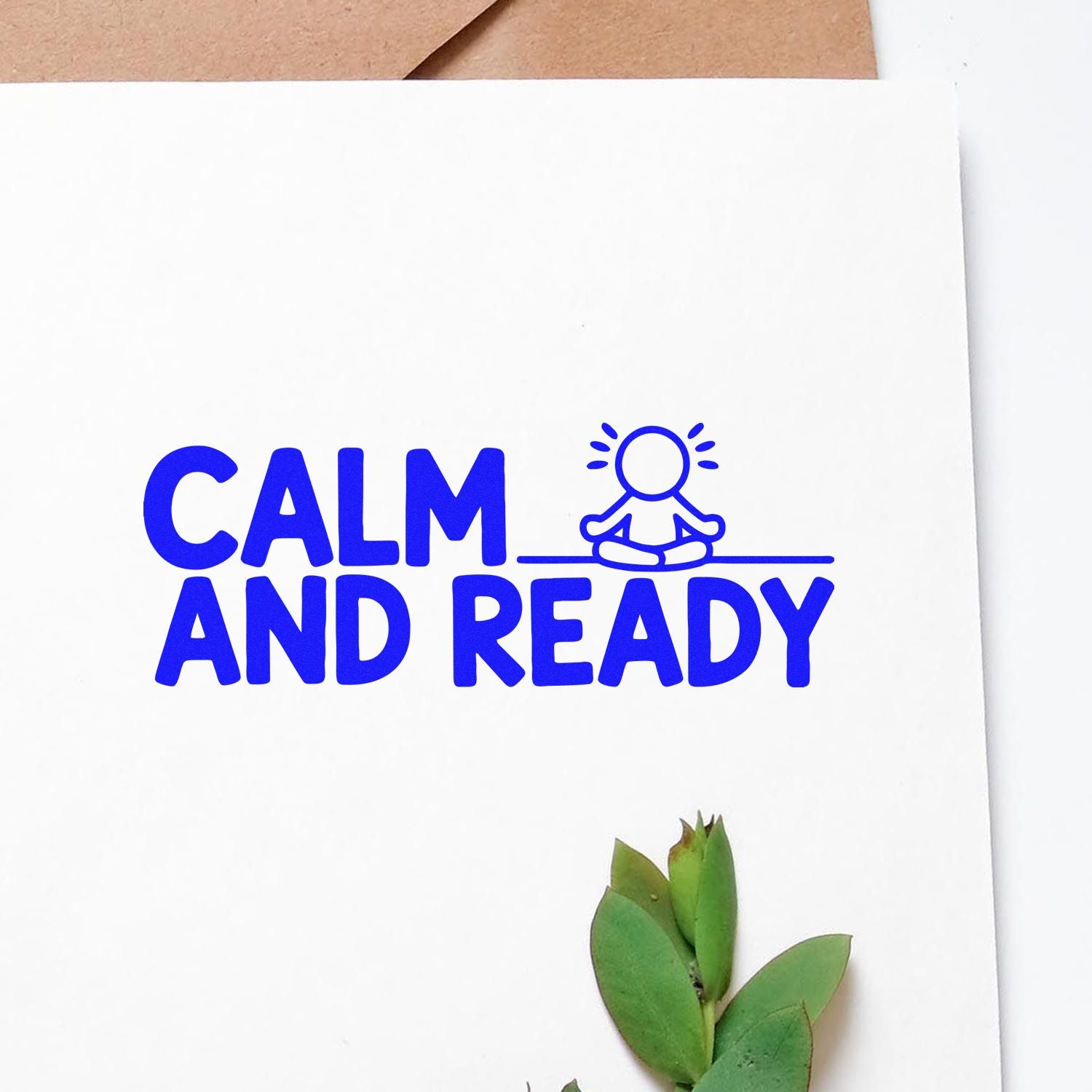 Blue CALM AND READY stamp and seal with meditating icon on white paper, accented by green leaves.
