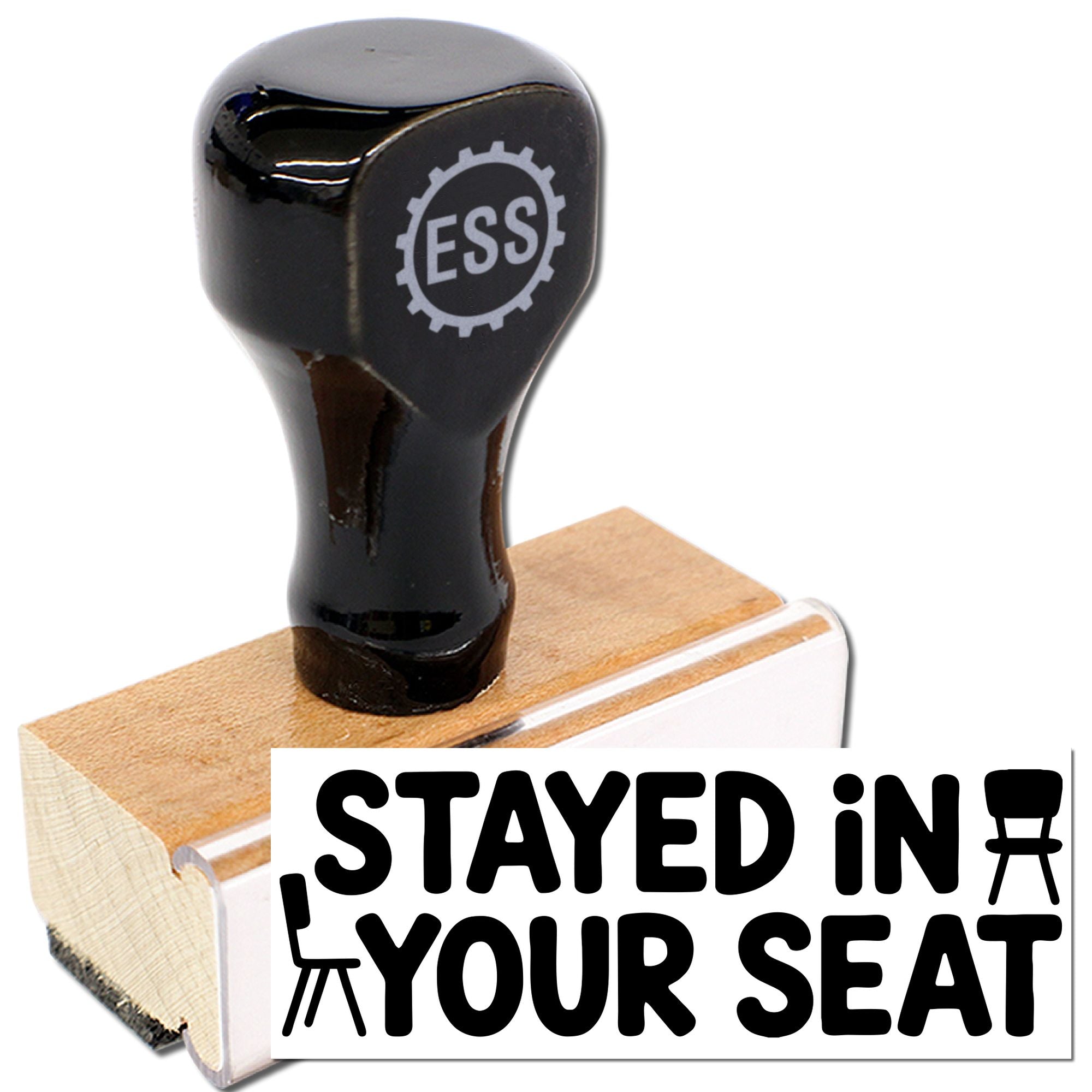 Black self-inking stamp seal with ESS logo on a tan wood block, featuring bold STAYED IN YOUR SEAT text.