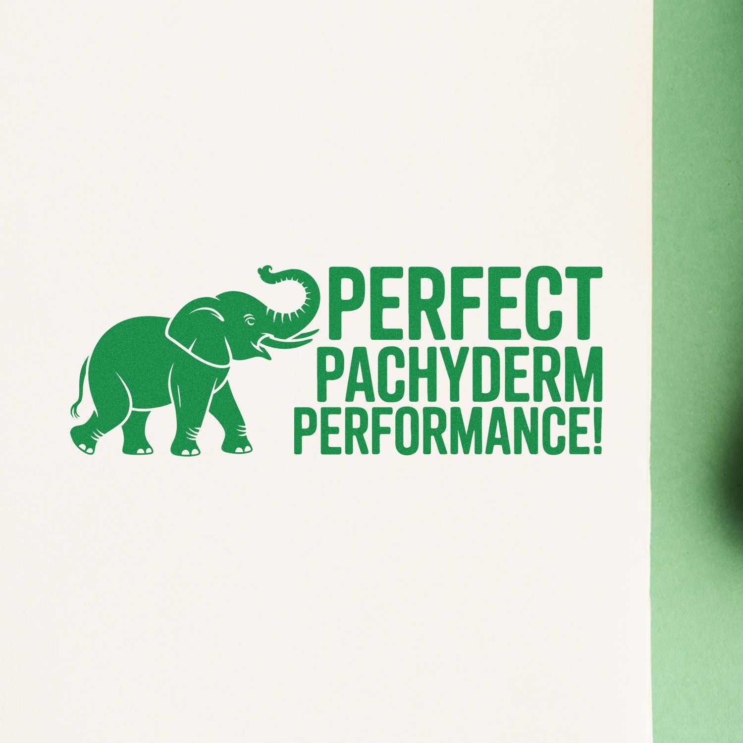 Green elephant stamp seal with Perfect Pachyderm Performance! on white paper, a bold green design for stamp products.