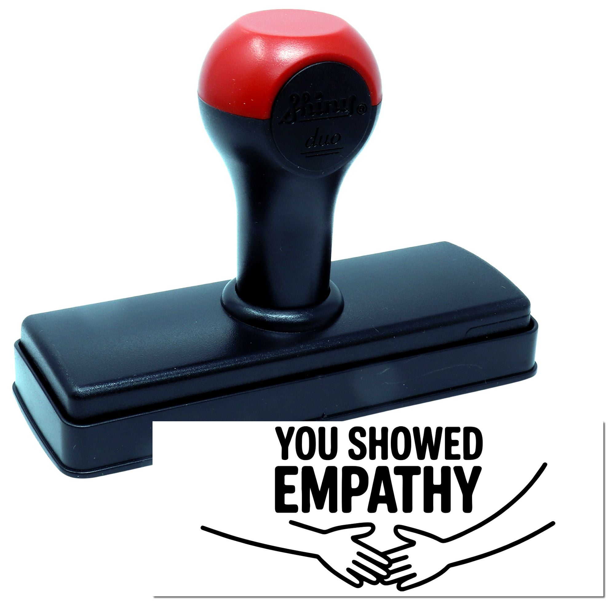 Red and black self-inking stamp with You Showed Empathy seal and handshake graphic.