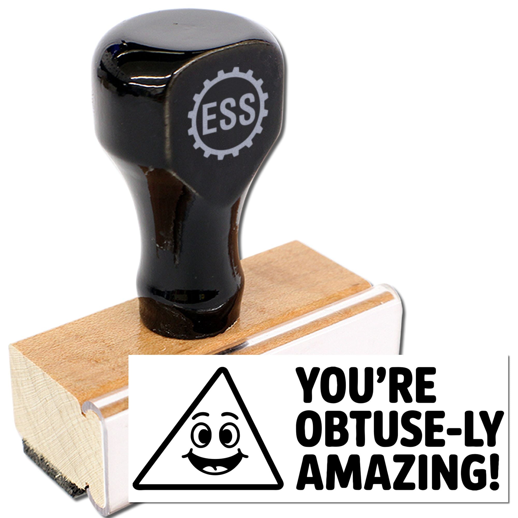 Black ESS self-inking stamp and wooden seal block with white card, bold black slogan, and smiling face icon.