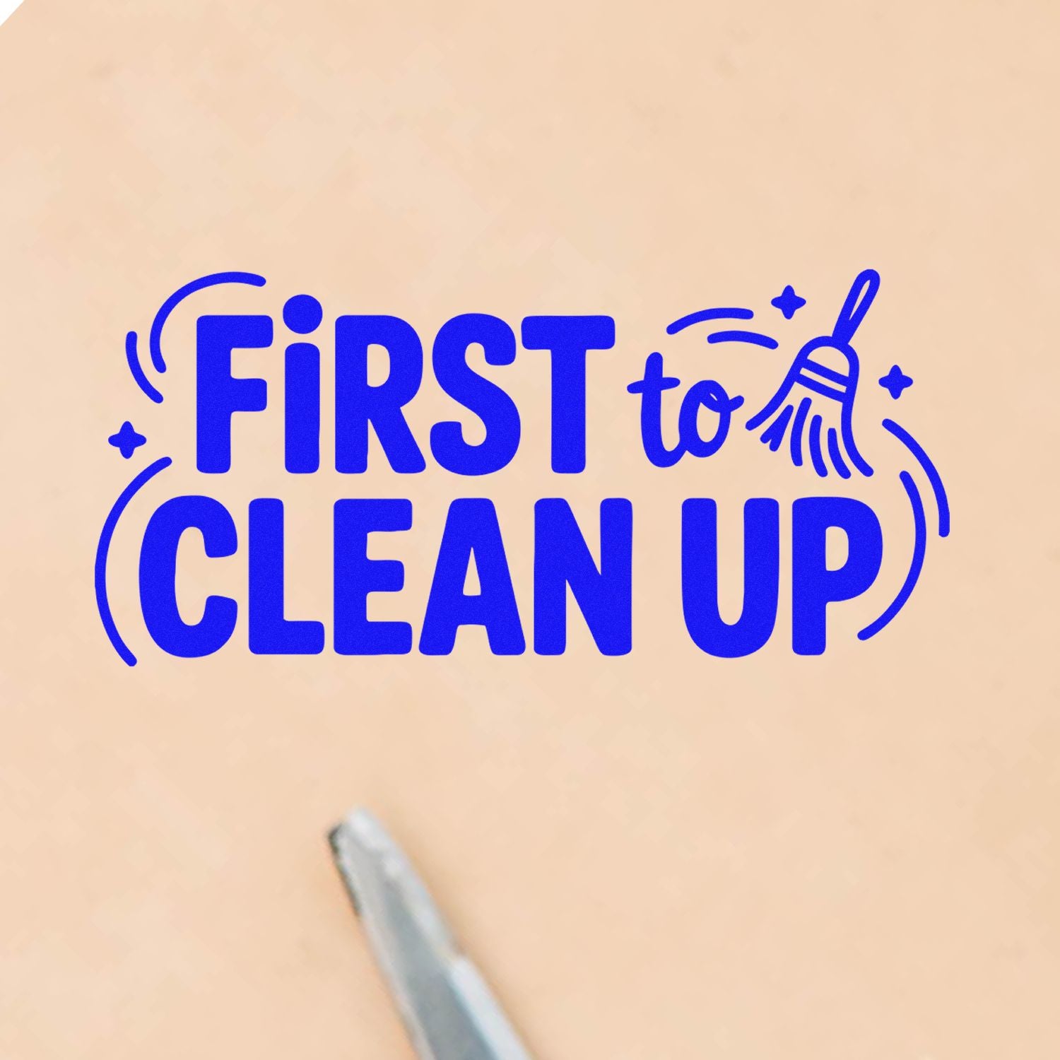 Blue FIRST CLEAN UP stamp design with broom icon on beige background, shown with a metallic seal tool tip.