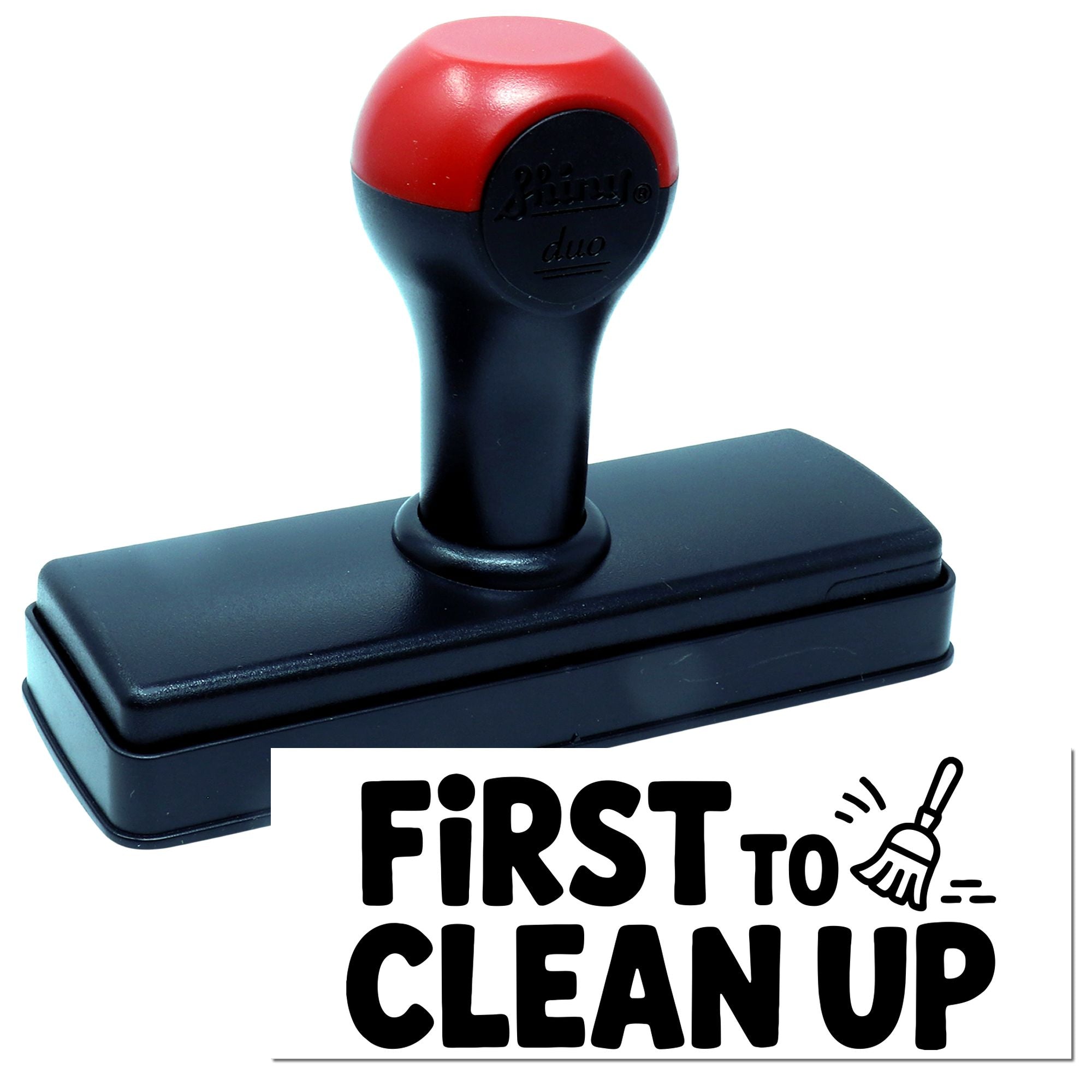 Red and black self-inking stamp and seal with rectangular base and FIRST TO CLEAN UP text.