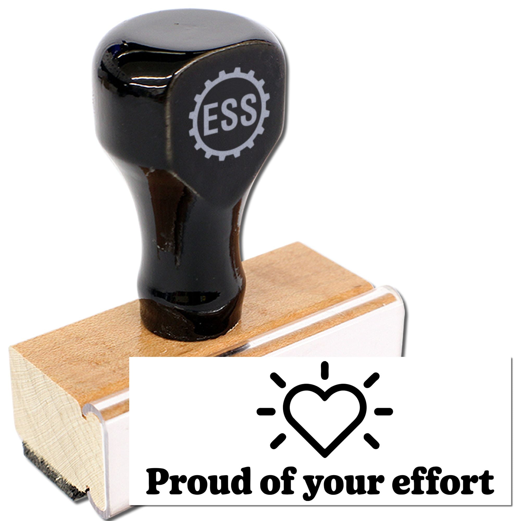Black wooden rubber stamp with ESS logo and Proud of your effort heart seal on a white card