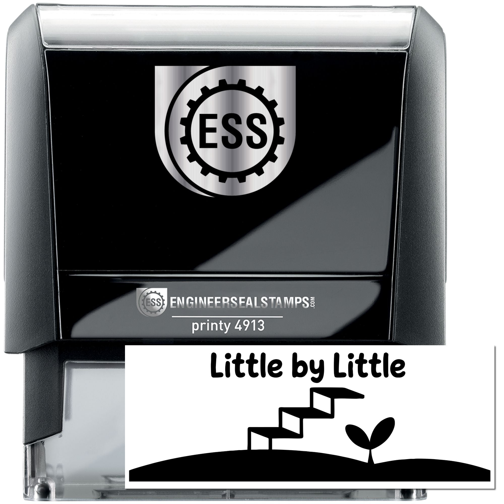 Black ESS engineer seal stamp with silver trim and white insert showing Little by Little design.