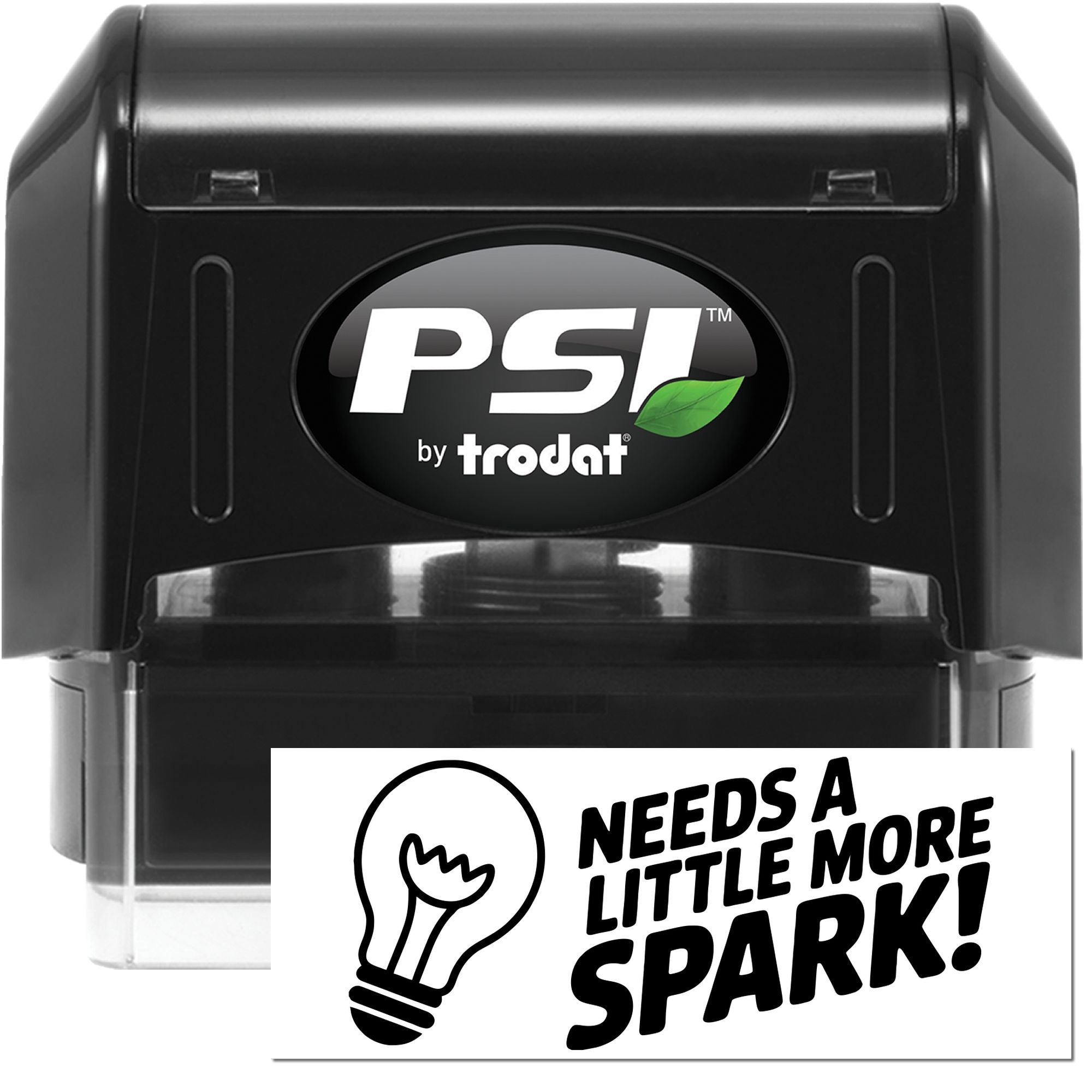 Black PSI by trodat self-inking stamp and seal, black casing with green leaf logo and white Needs a little more spark! imprint.