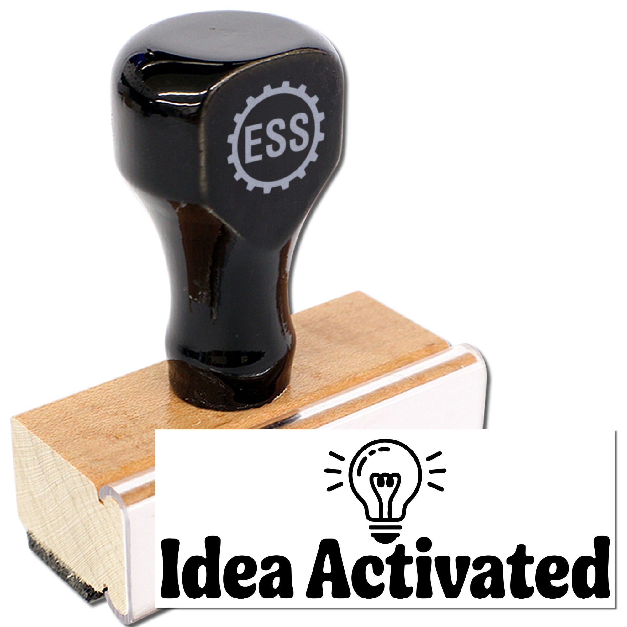 Black stamp and seal on a wooden block, featuring an ESS logo and Idea Activated text on a white card.