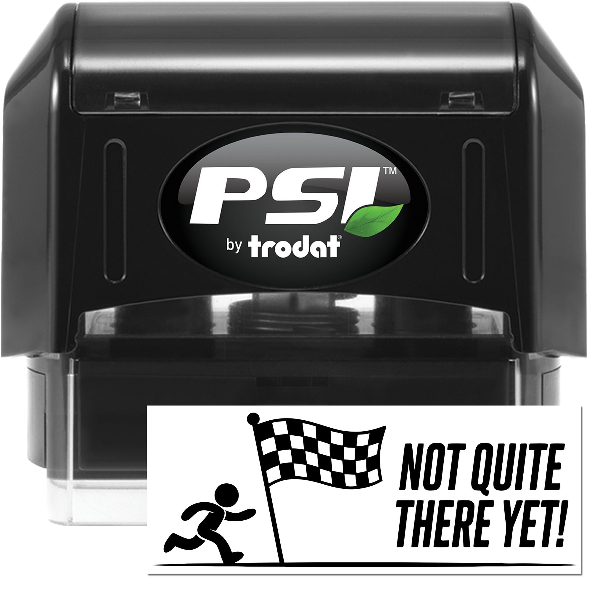 Black PSI by Trodat self-inking stamp and white seal sticker with green leaf logo and Not Quite There Yet! text.