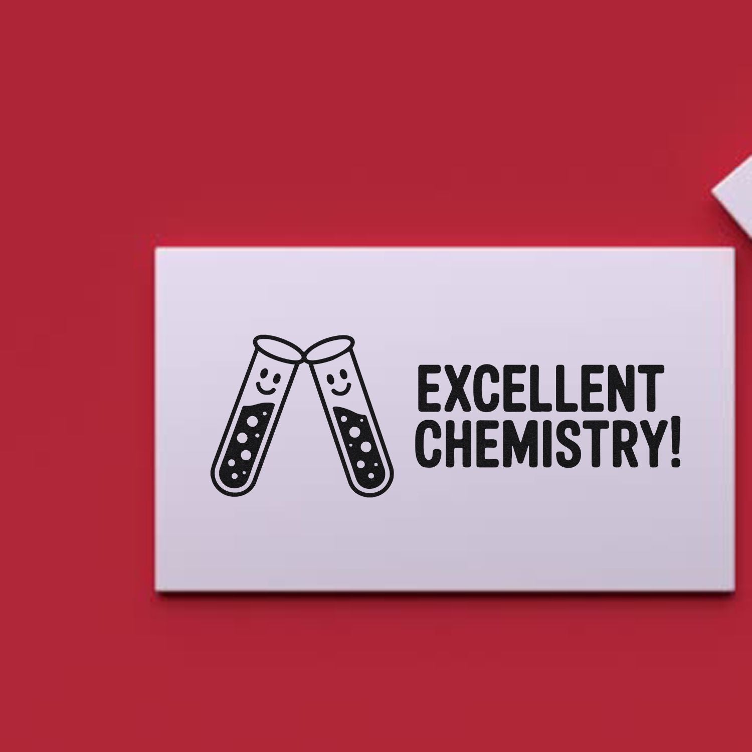 White stamp seal with black test tubes and Excellent Chemistry! on a red background.