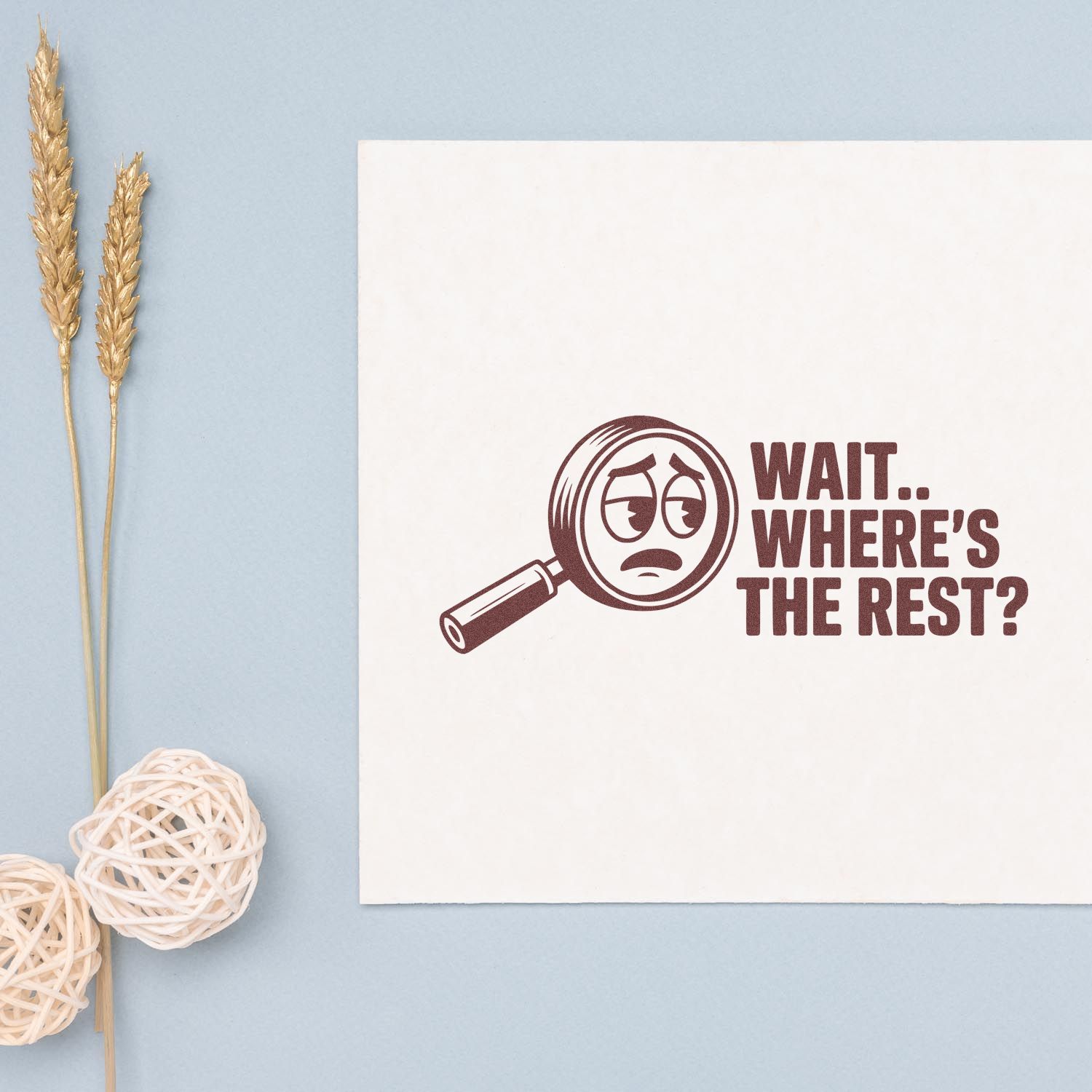 Custom burgundy rubber stamp seal with sad magnifying glass and WAIT.. WHERES THE REST? on a white card.