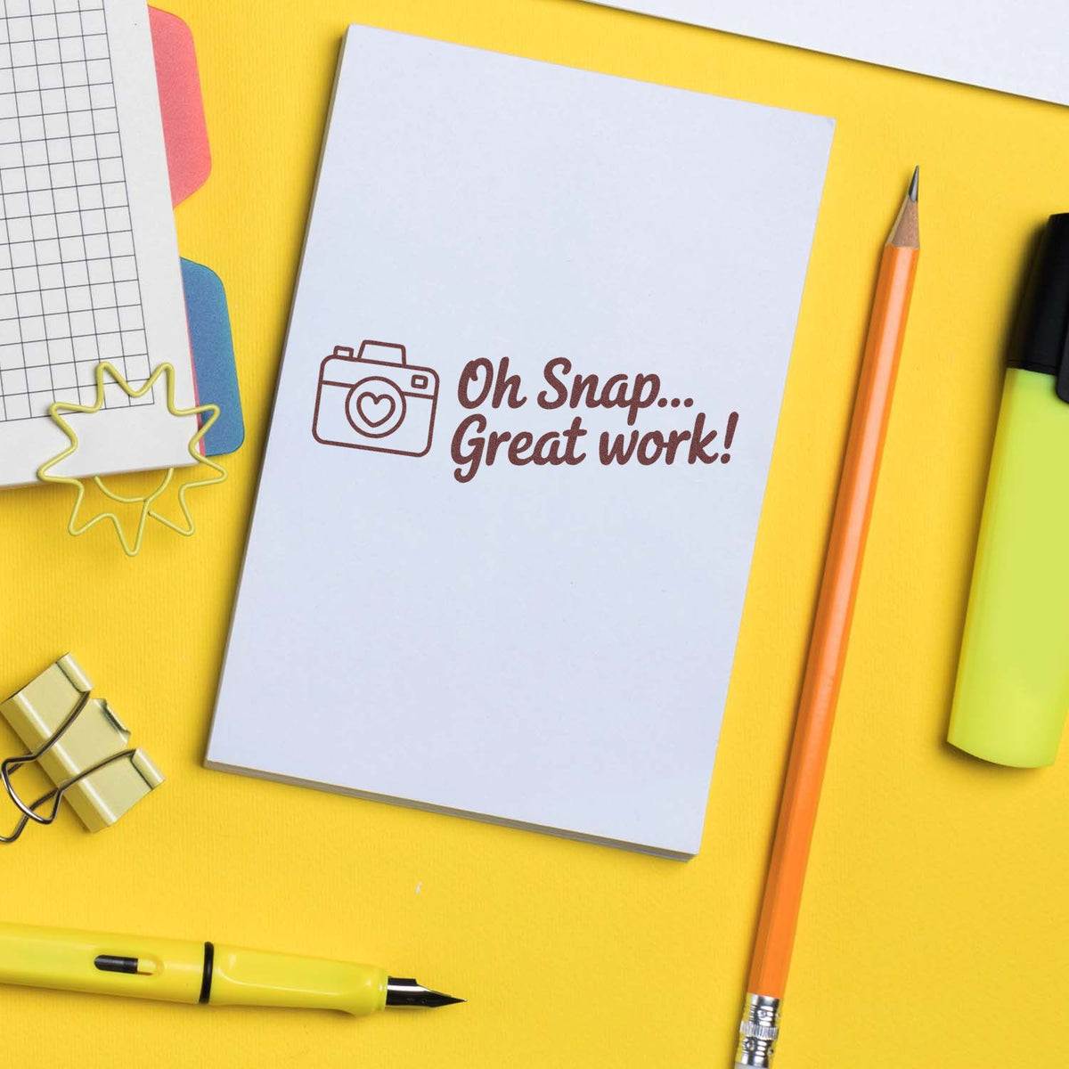 Trodat Motivational Teacher Great Work Oh Snap pre-inked stock stamp in use, featuring motivational message for teachers.