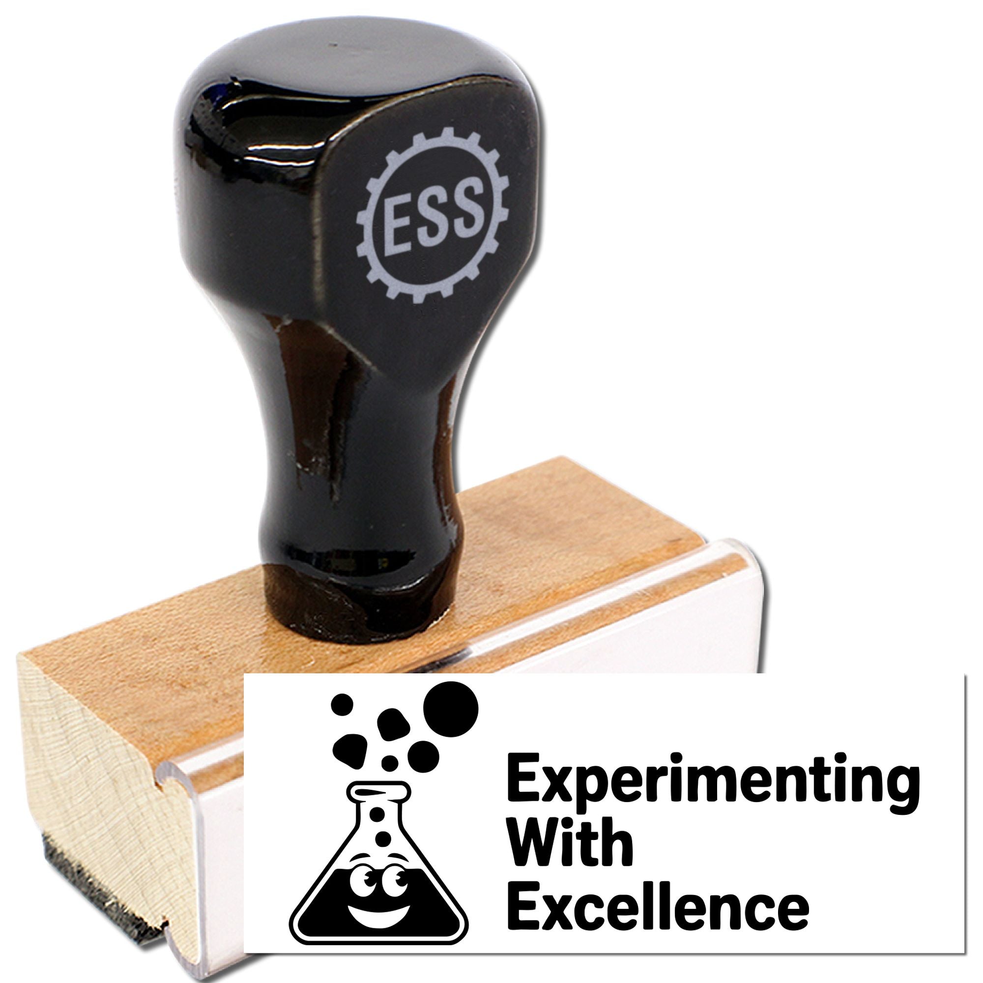 Black ESS rubber stamp seal on wooden handle with white label reading Experimenting With Excellence