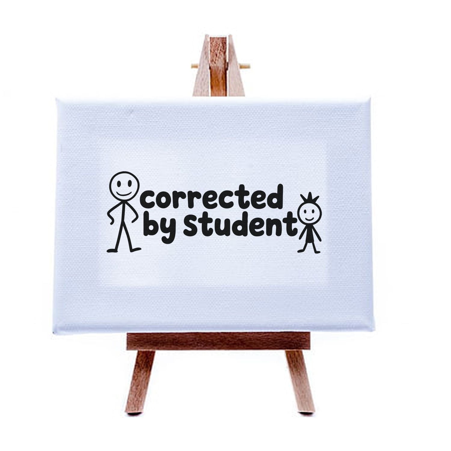 Light blue stamp seal on wooden easel with black corrected by student text and stick figures