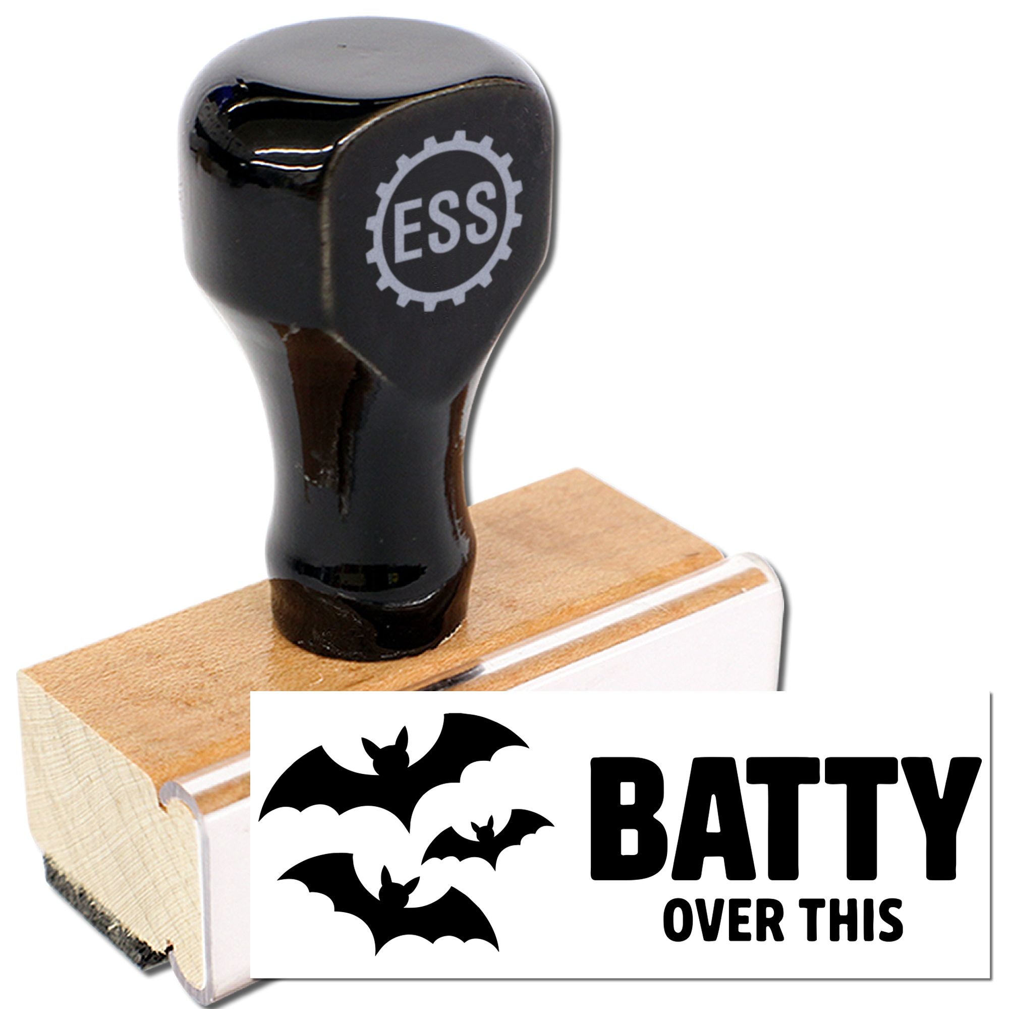 Black rubber stamp seal on wooden block, with ESS logo and bat-themed BATTY OVER THIS design on white card.