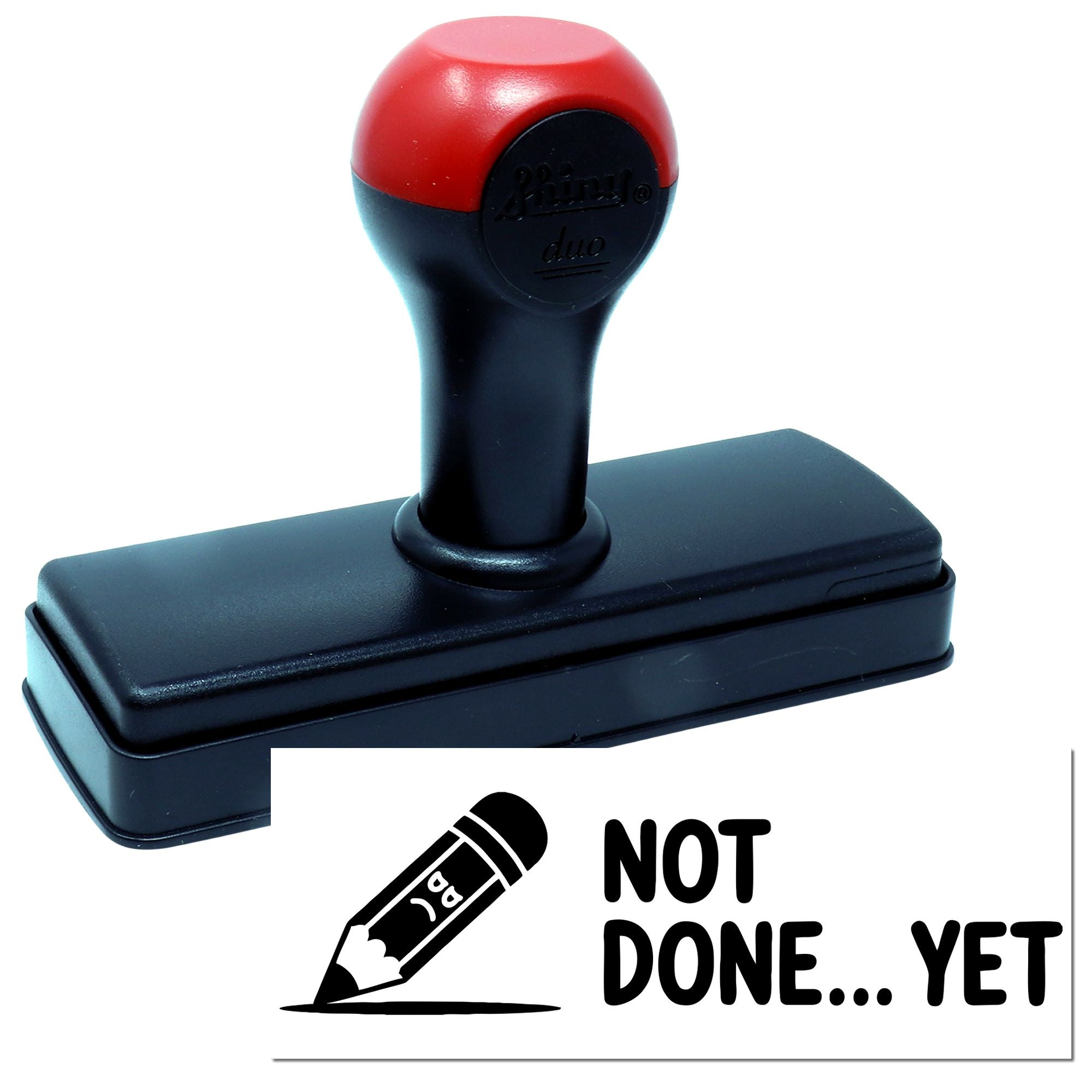 Red and black self-inking stamp and seal with Not Done Yet pencil design on white background.
