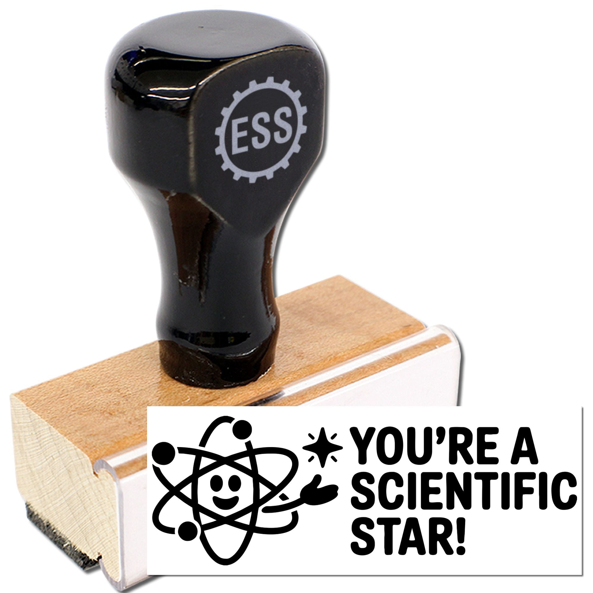 Black rubber stamp and seal on wooden block, featuring ESS gear logo and white text seal: Youre a scientific star!