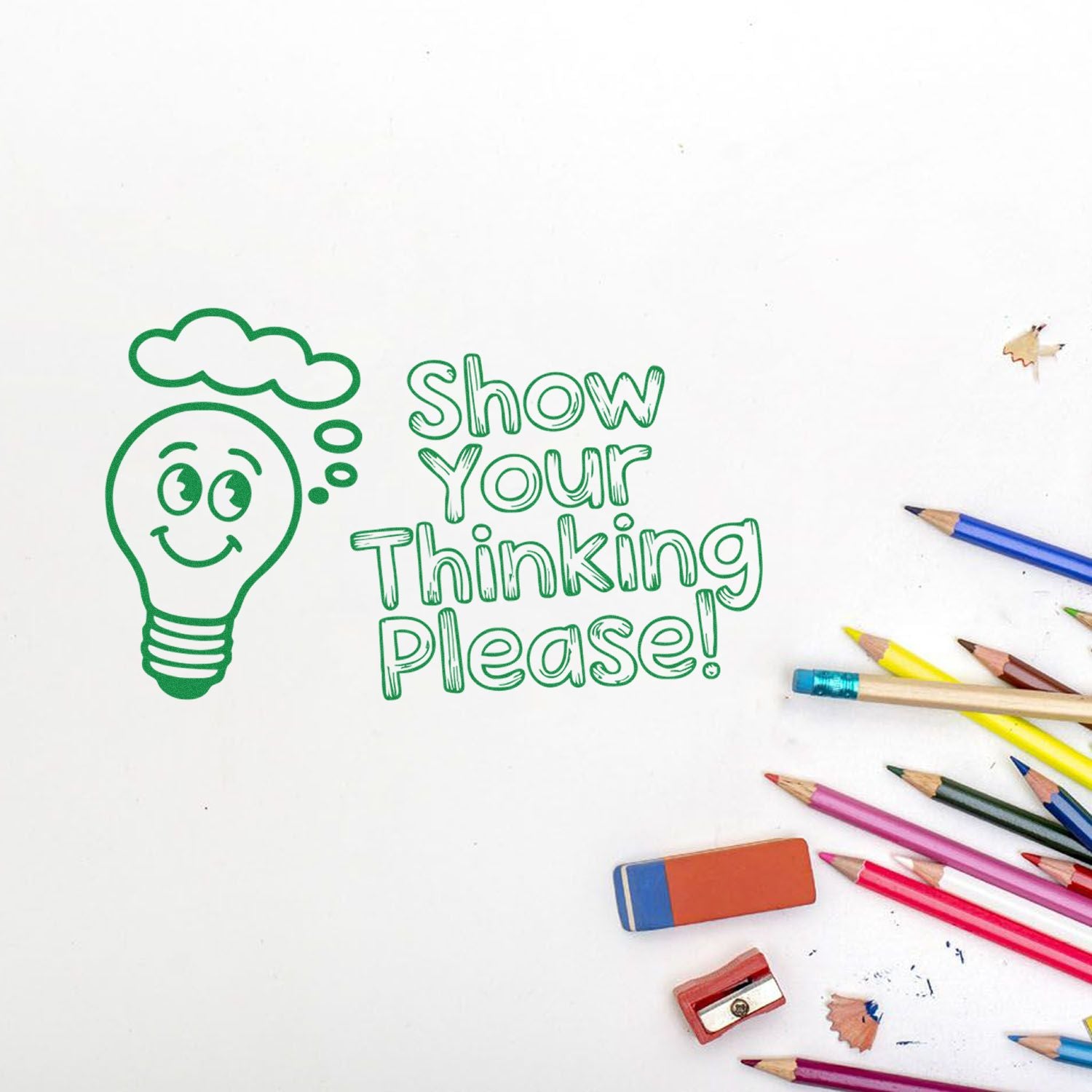 Green stamp-and-seal design with smiling lightbulb and Show Your Thinking Please! text, surrounded by colored pencils.