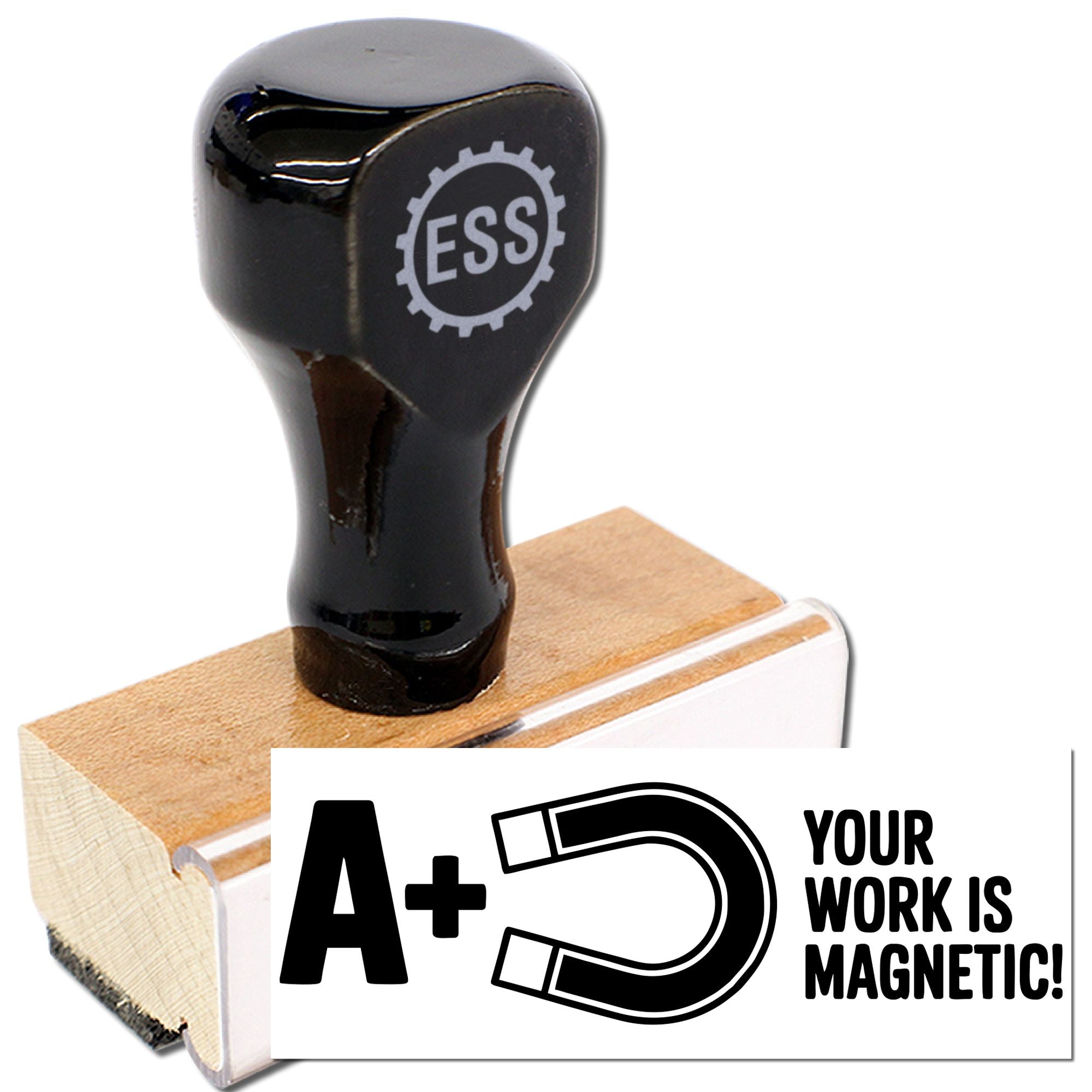 Black rubber stamp on wooden base with magnetic seal, featuring A+ and Your work is magnetic text.