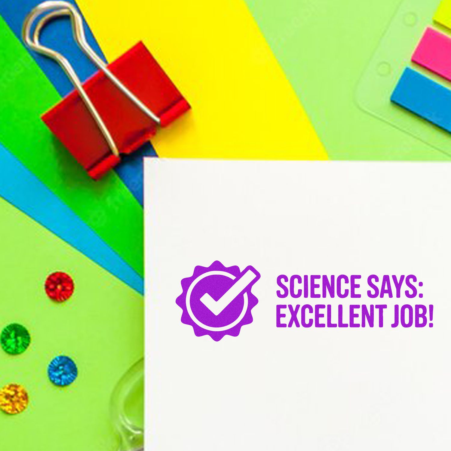 White card with purple stamp and seal reading Science Says: Excellent Job! on a bright multicolor stationery background.