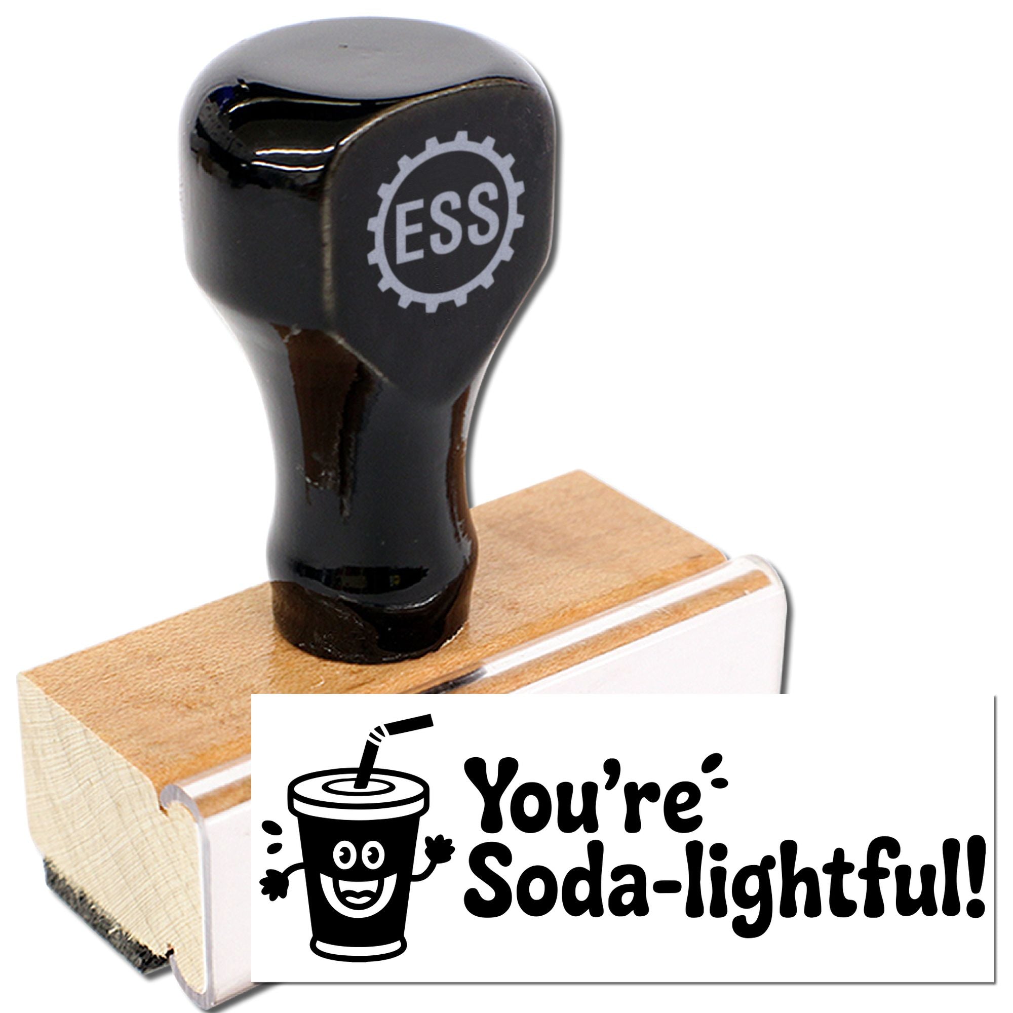 Black ESS stamp and seal on a wooden base, printing a playful Youre Soda-lightful! soda cup design.