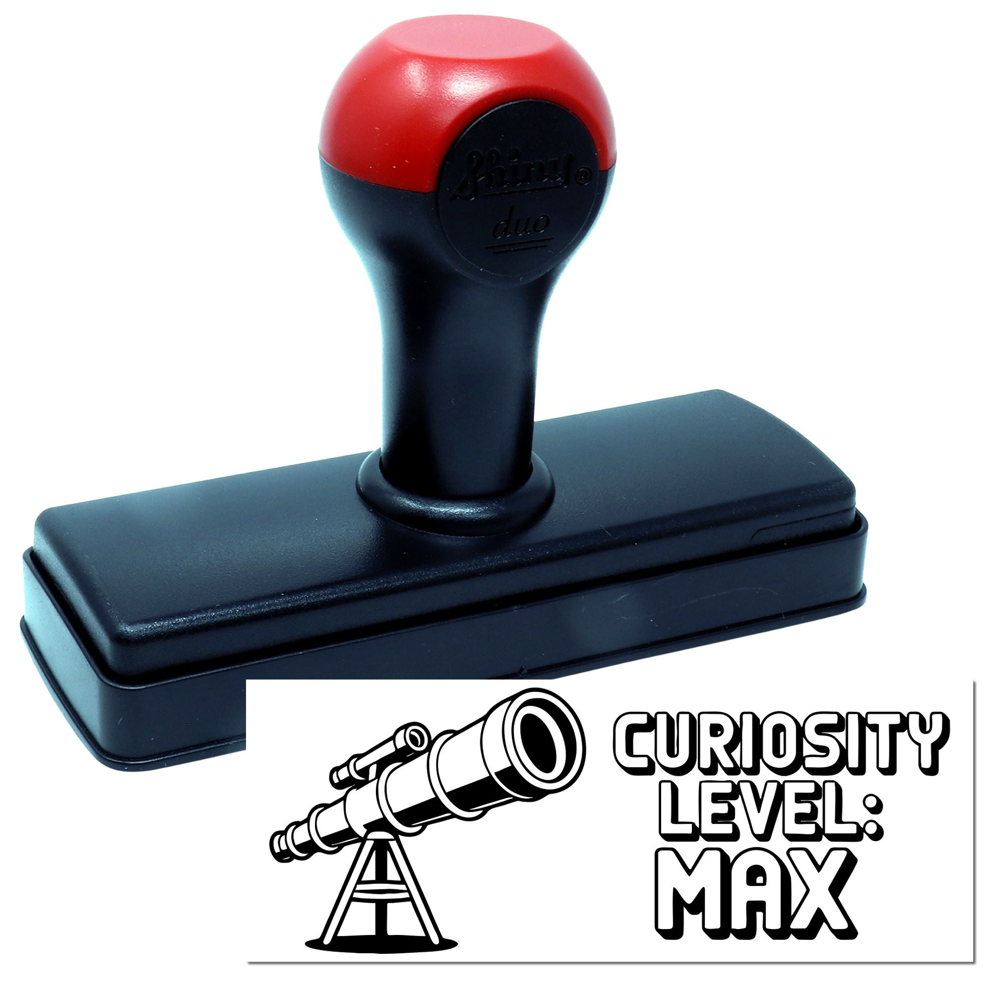 Black self-inking stamp with red handle and telescope seal reading Curiosity Level: Max on white background.