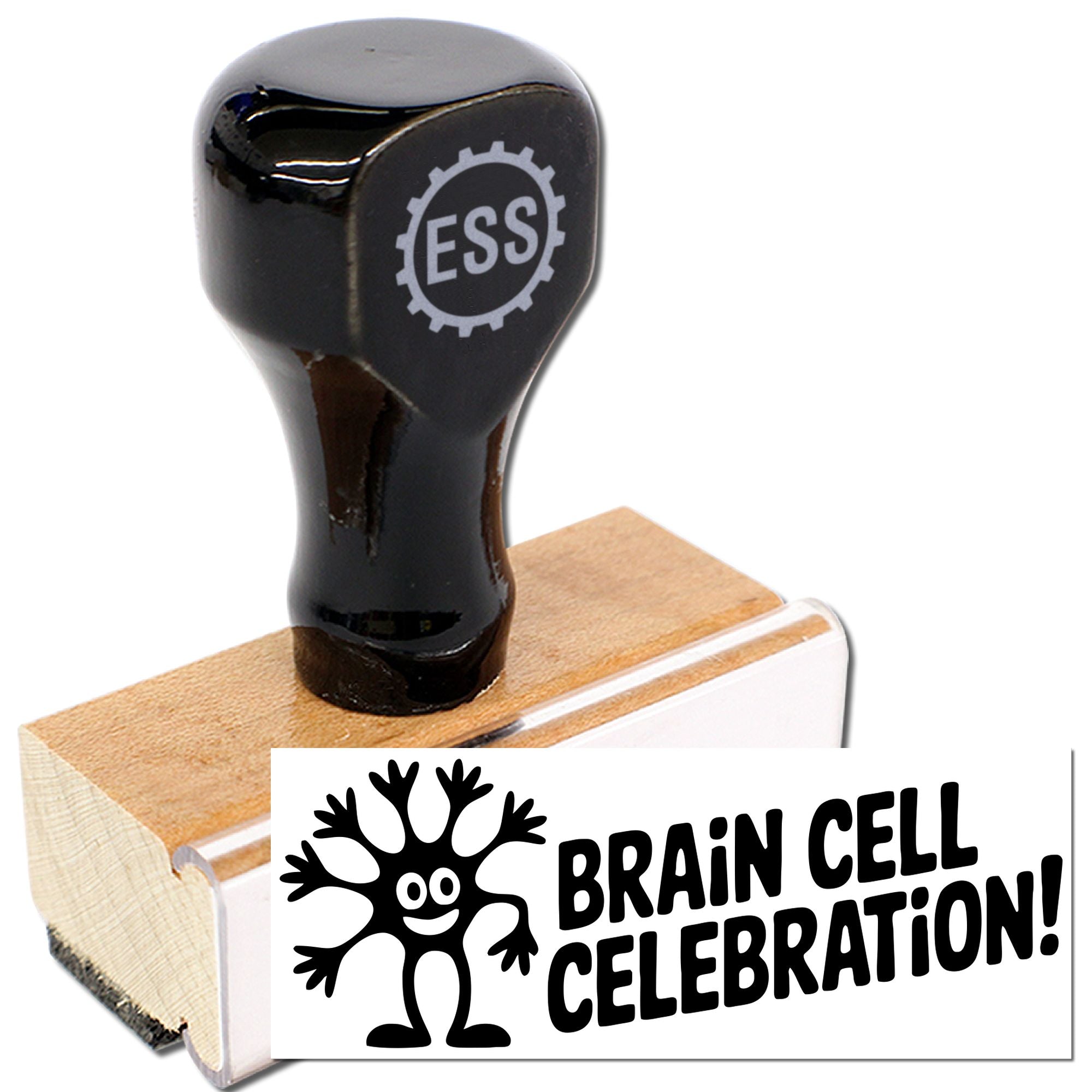 Black ESS rubber stamp on wooden base, stamping a white card with bold black BRAIN CELL CELEBRATION! and brain-cell graphic.