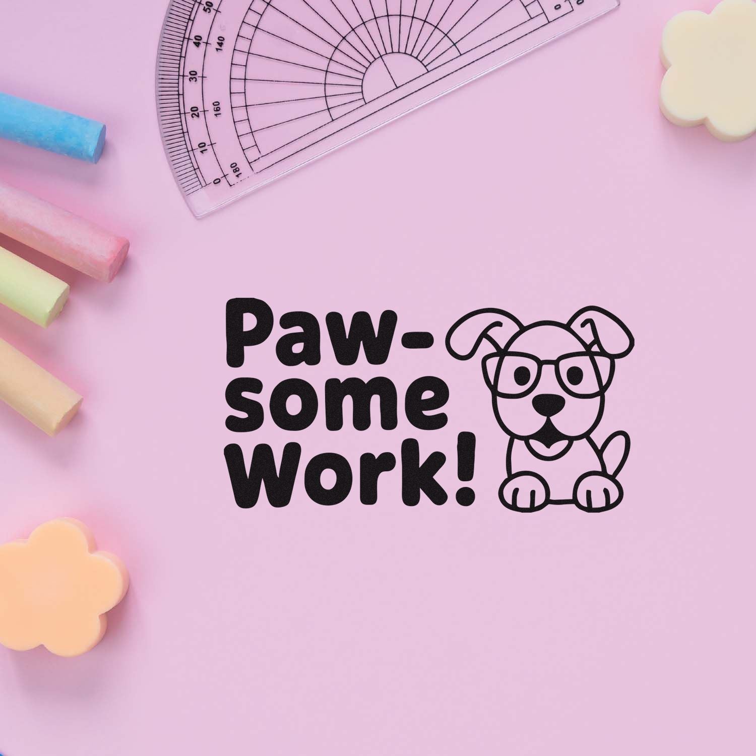 Black Paw-some Work! dog stamp and seal on pastel pink background with ruler and colorful chalk shapes.