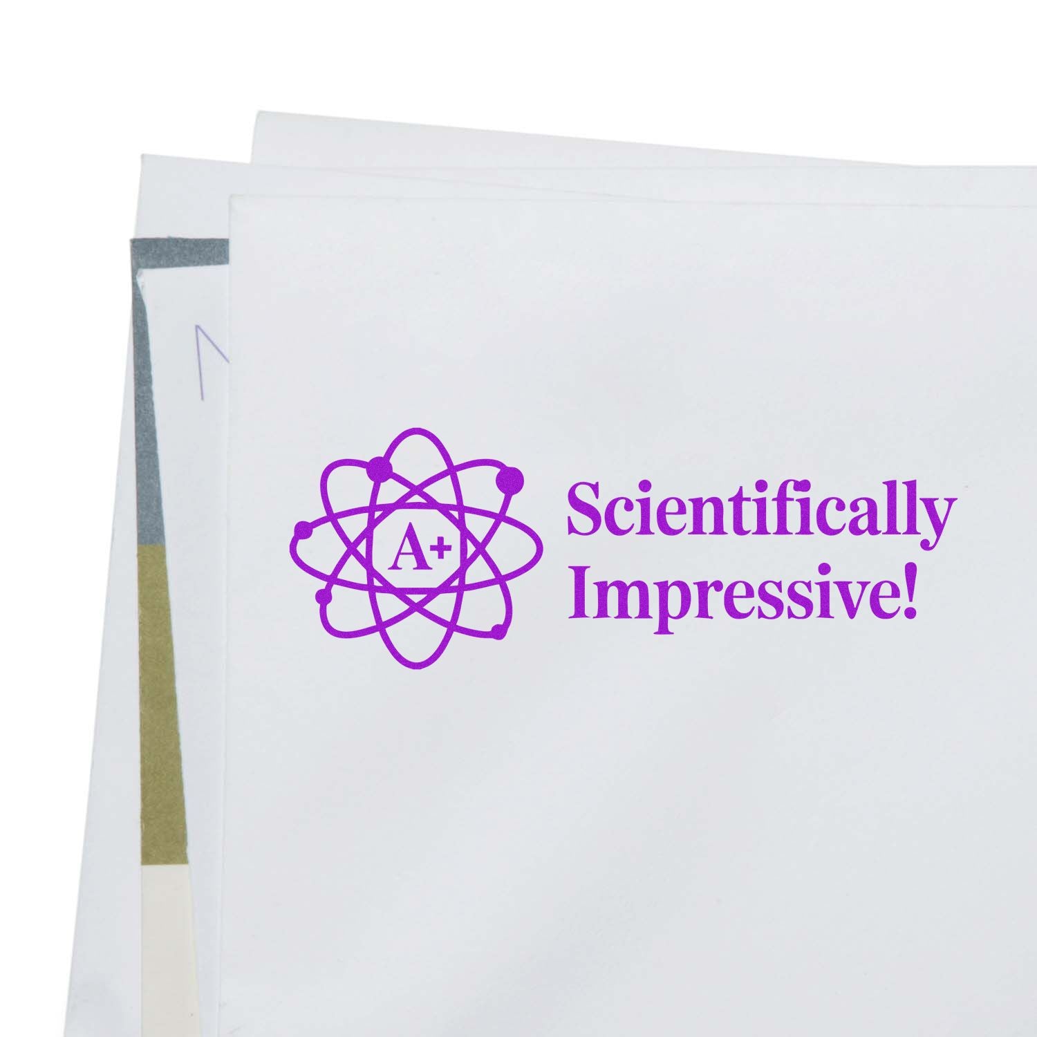 Purple custom stamp seal with A+ atom icon and Scientifically Impressive! on white paper.