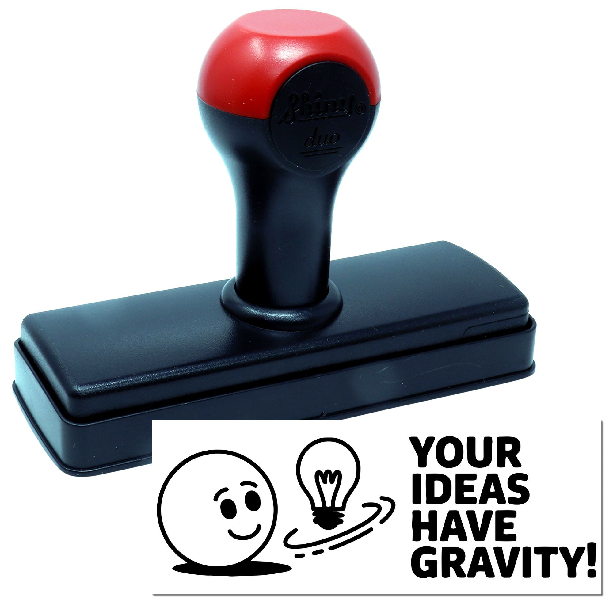 Red and black self-inking stamp with rectangular base and custom seal reading Your ideas have gravity!
