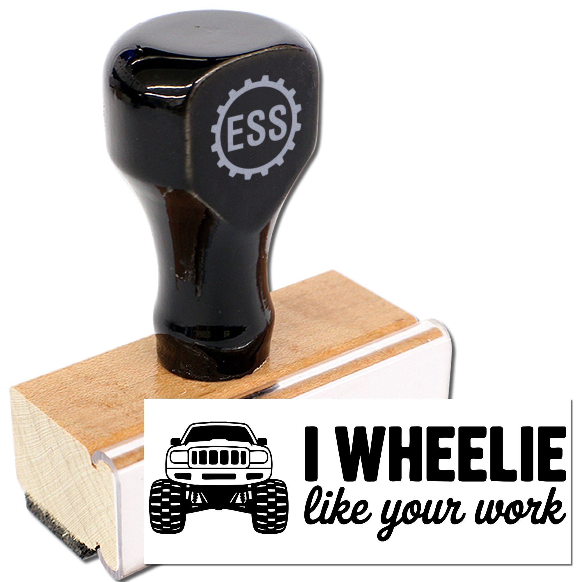 Black rubber stamp and seal with wooden base, stamped I WHEELIE like your work and a truck graphic.